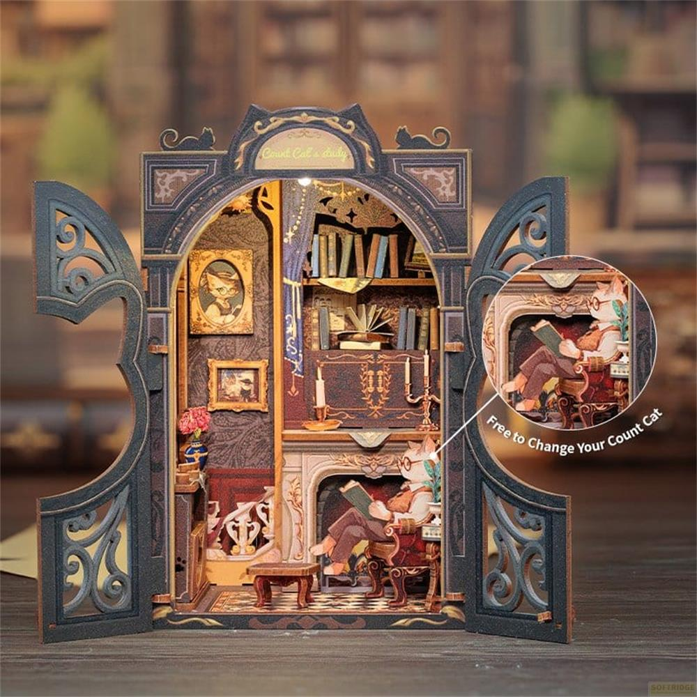Ein Miniatur-Arbeitszimmer mit Büchern, einem Kamin und einer Katze, die liest.
