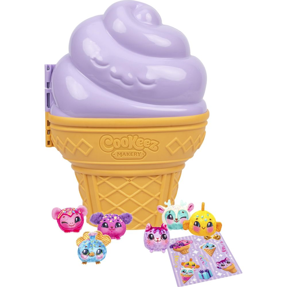 Un jouet en forme de cône de glace violet avec de petits jouets créatures colorés et des autocollants.