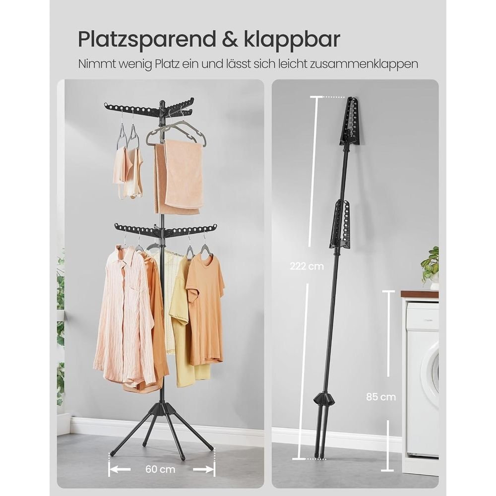 Ein zusammenklappbarer Wäscheständer mit Kleidung und Handtüchern.