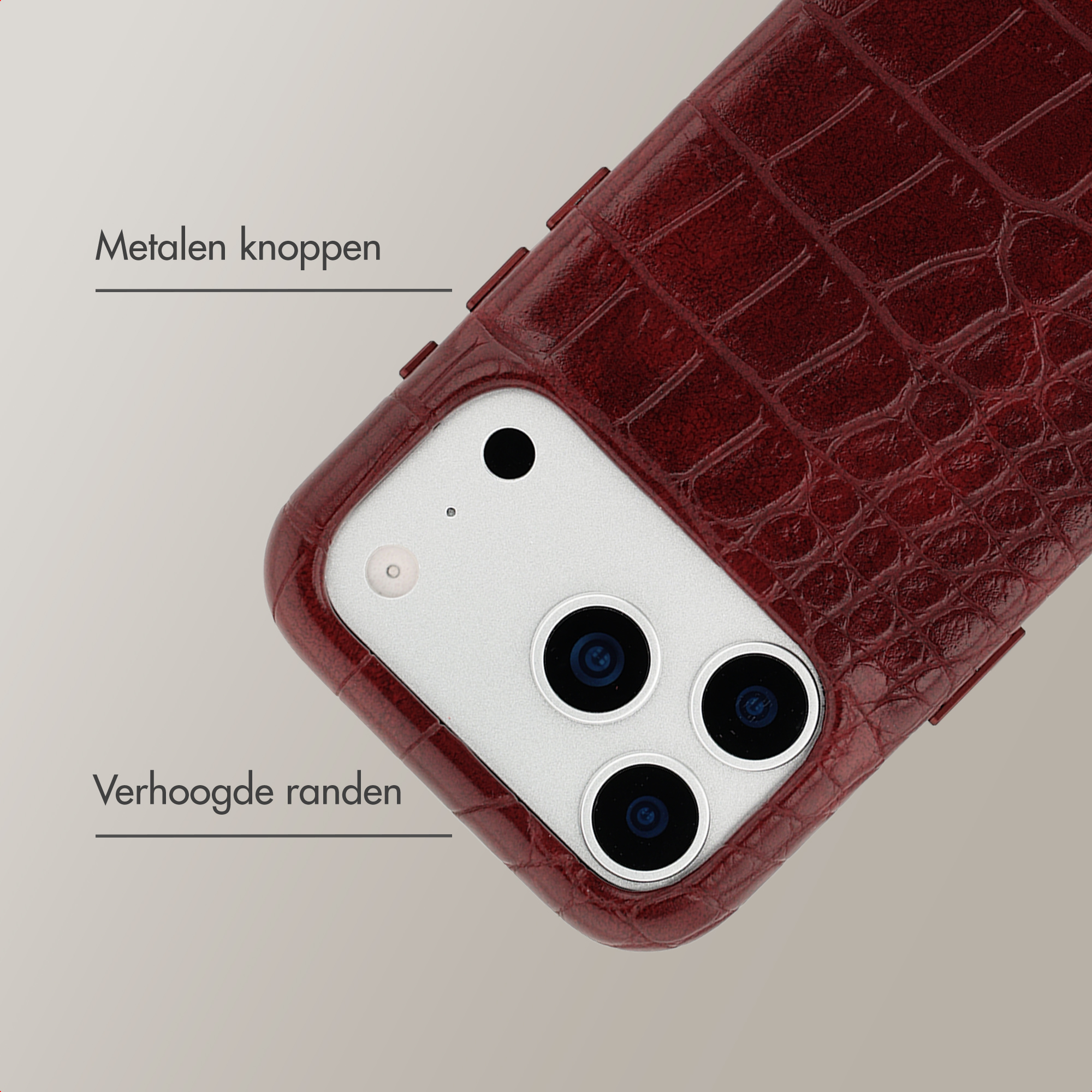 Rote Krokodilleder-Handyhülle mit Kameraausschnitt und Metallknöpfen.