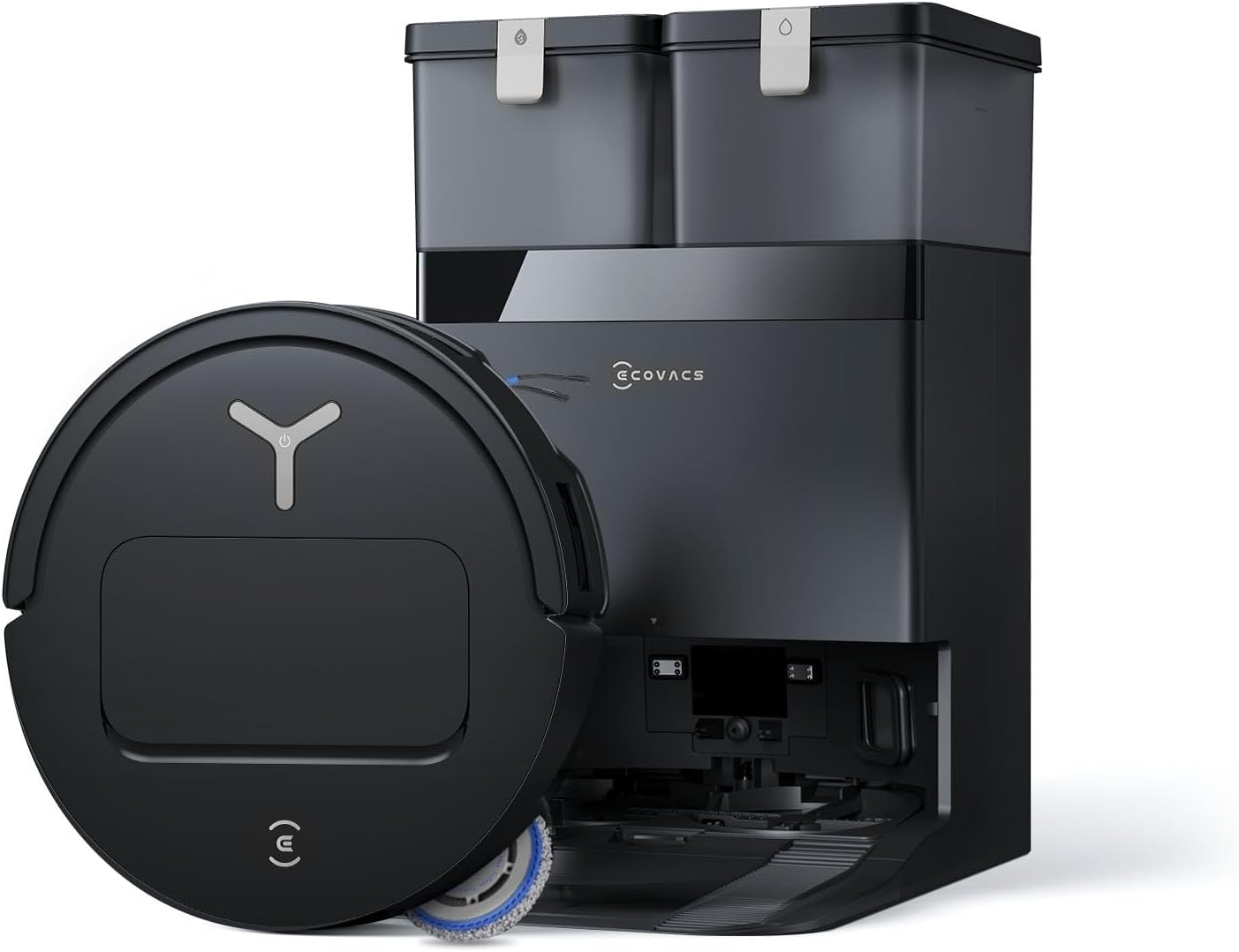 Un robot aspirateur noir est positionné devant une station de charge noire avec deux bacs.