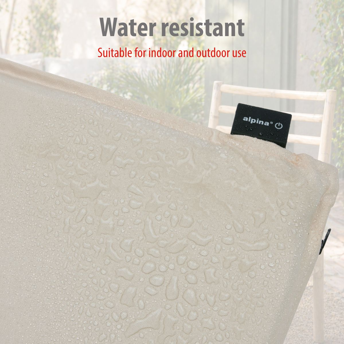 Beige fabric surface with water droplets. A black tag with 'alpina' logo is visible.