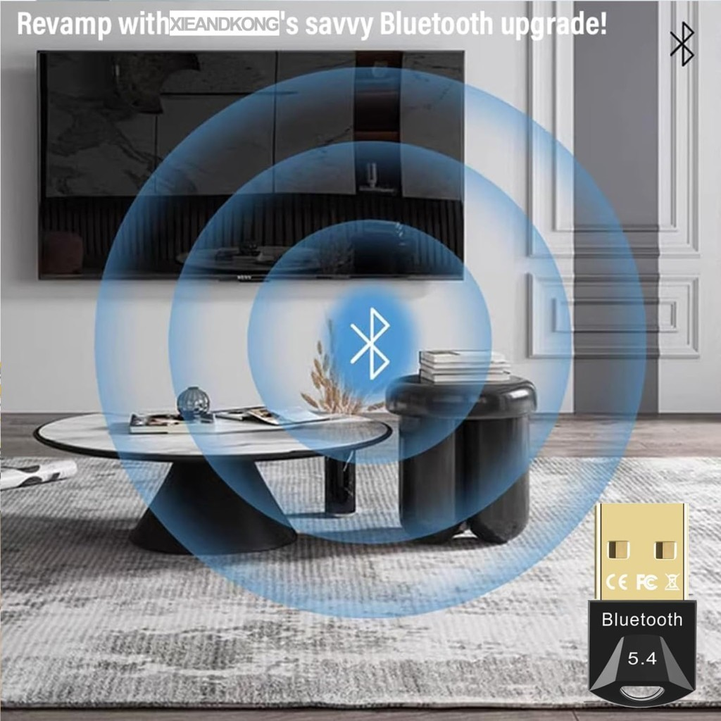 TV ve sehpa önünde dalga desenli Bluetooth adaptörü.