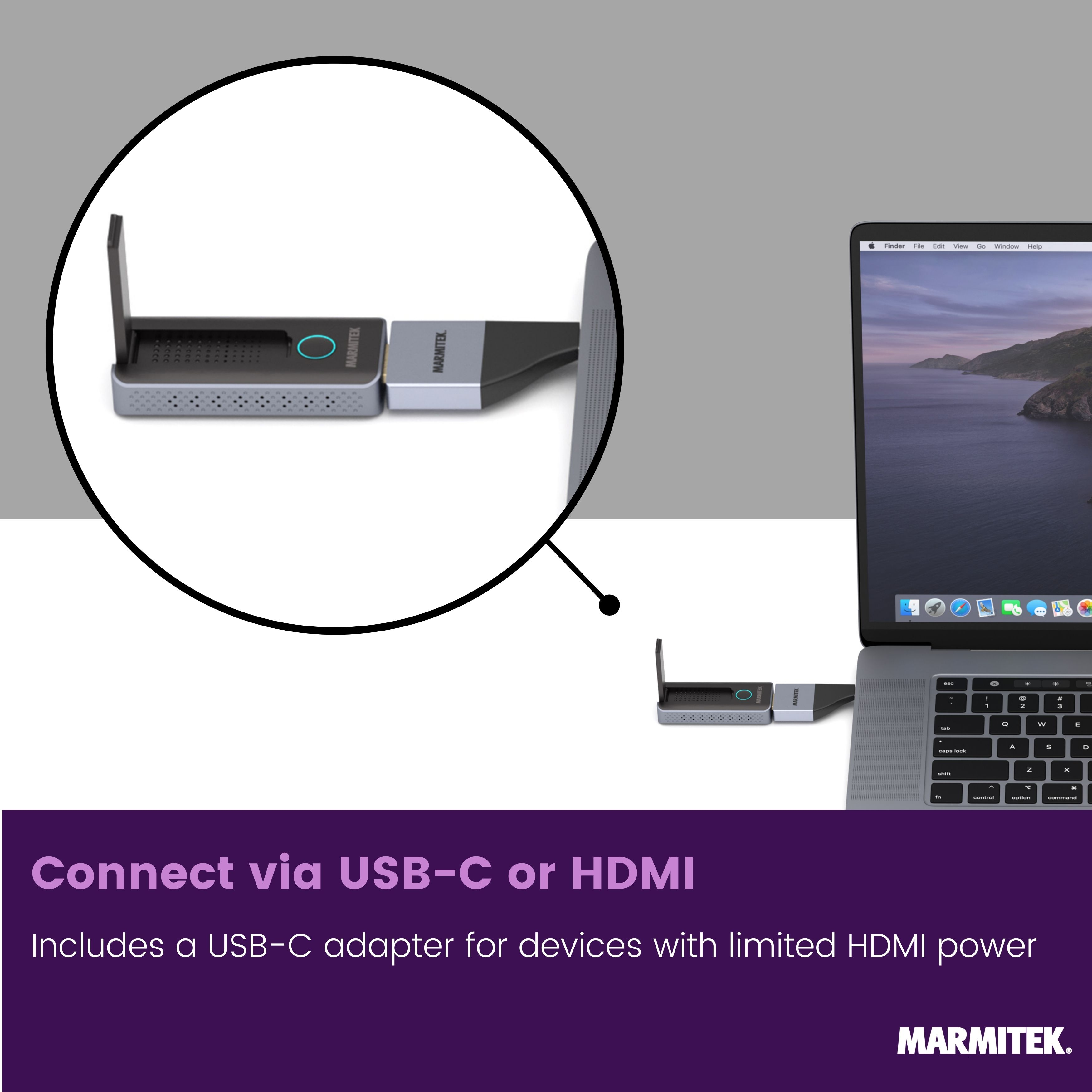 Een Marmitek adapter is aangesloten op een laptop. Een Mac-scherm is zichtbaar.