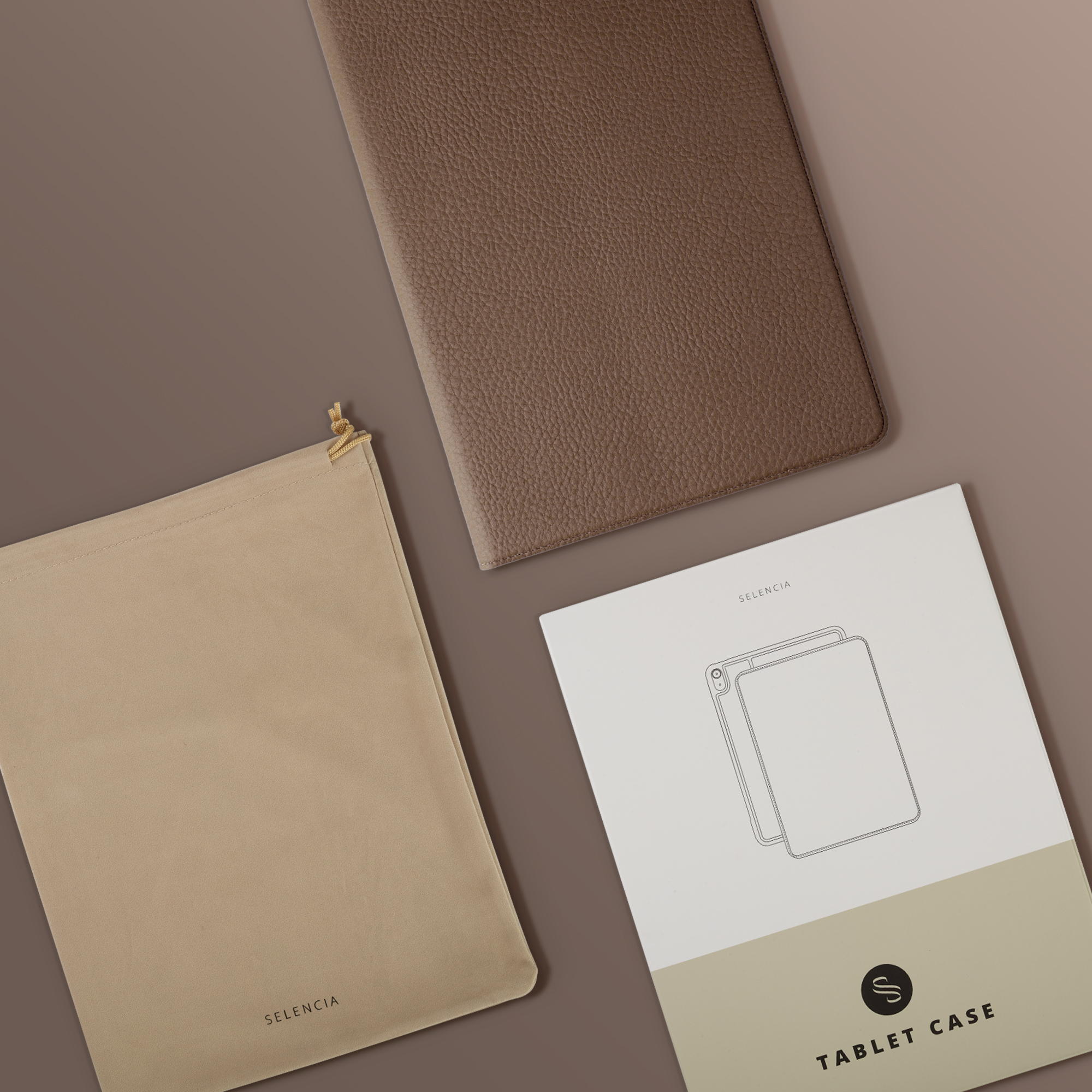 Brown tablet case, a beige fabric pouch, and packaging with a tablet illustration.