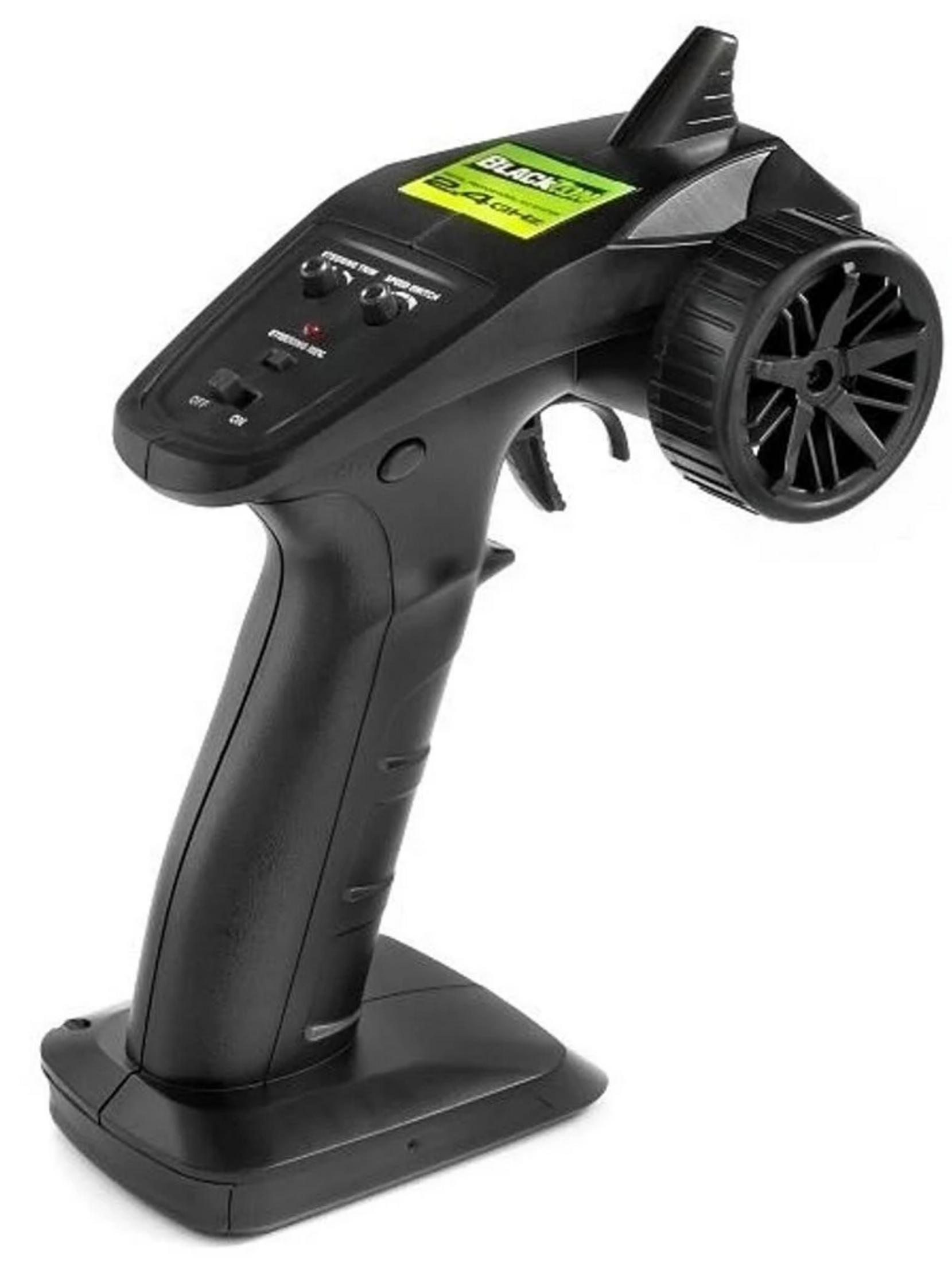 Émetteur RC noir avec volant et gâchette, autocollant jaune.