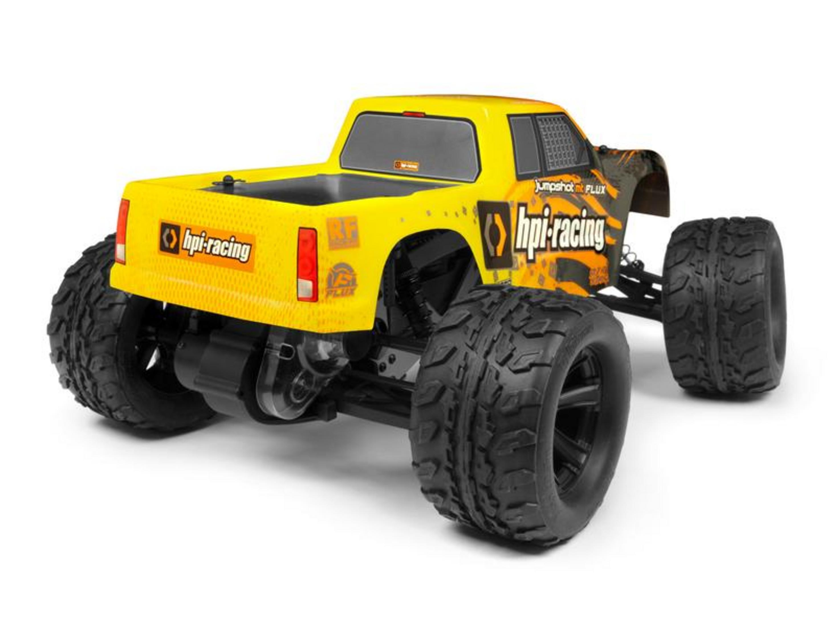 Gelber HPI Racing Monstertruck mit großen schwarzen Reifen und Rennaufklebern.