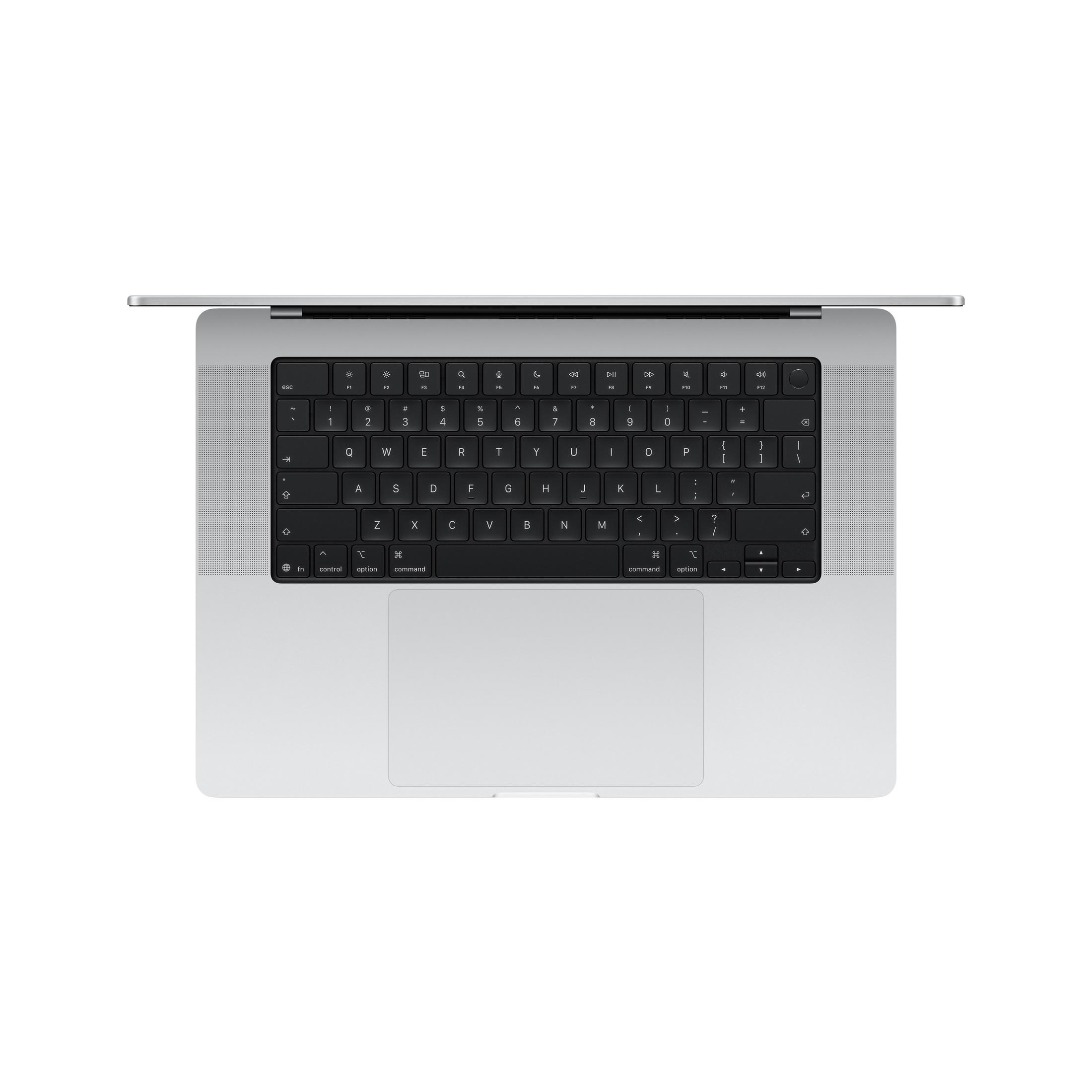 Ordinateur portable argenté vu de dessus, clavier et trackpad visibles.