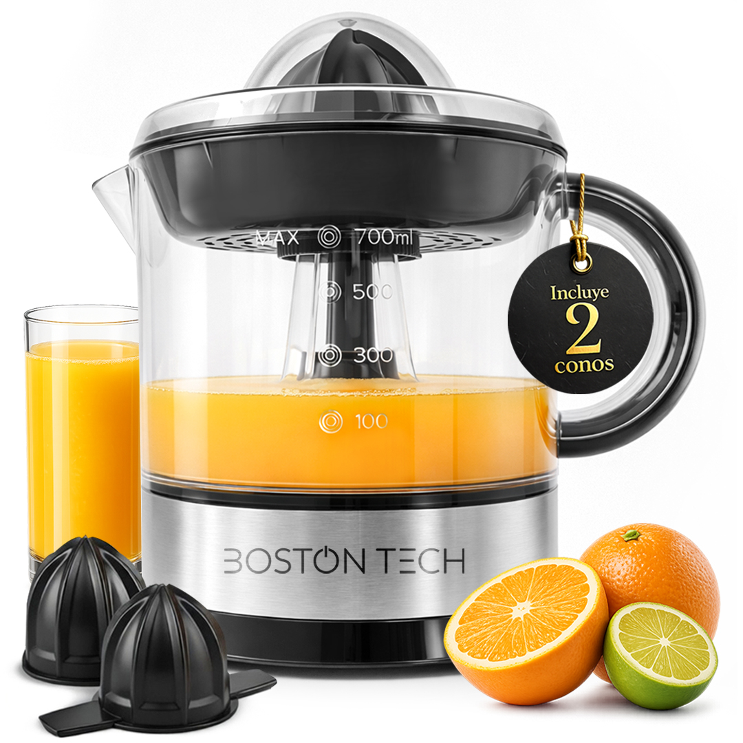 Spremiagrumi elettrico con caraffa in vetro, arance, lime e succo.