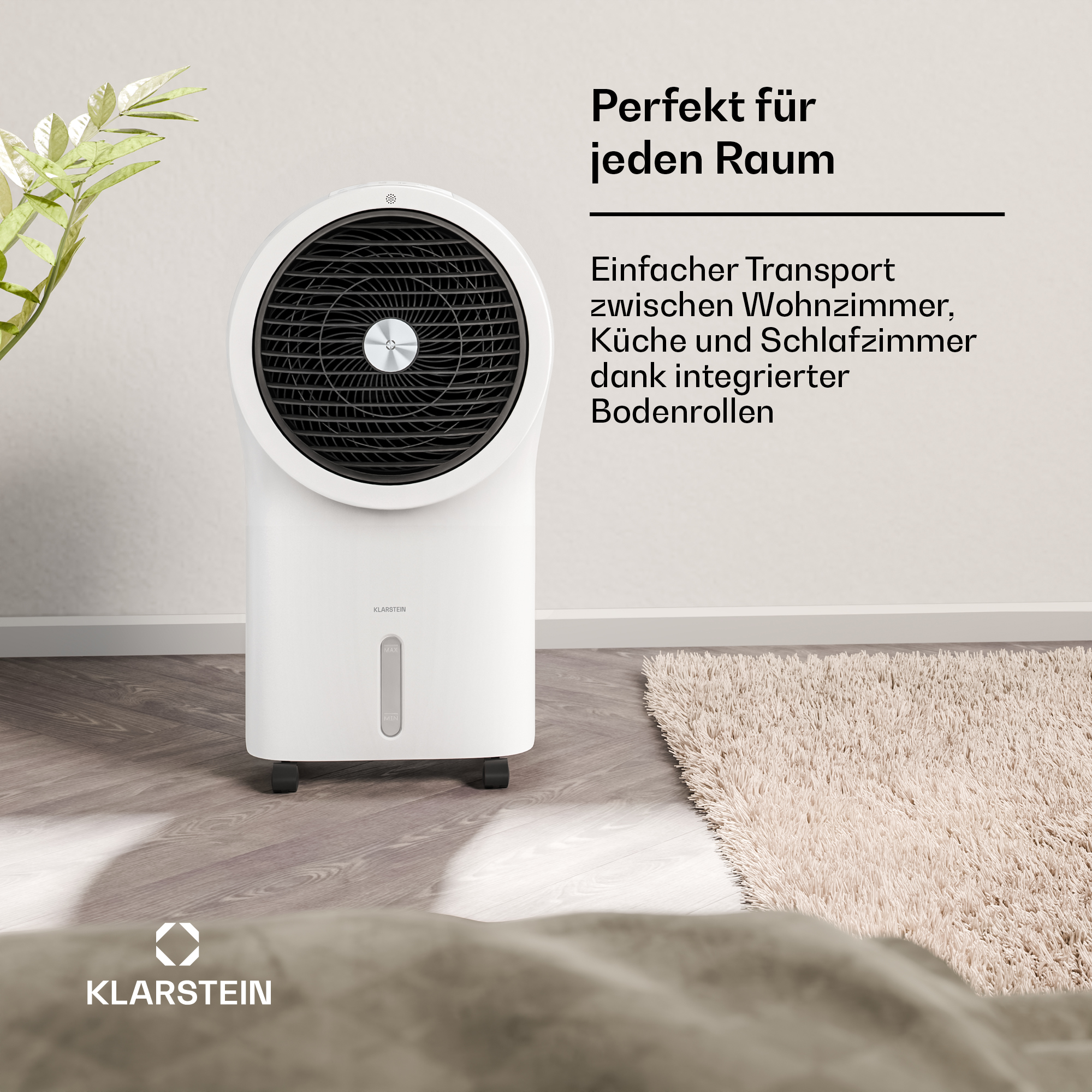 Weißer Luftkühler mit schwarzem Lüftergitter und grünem Blattwerk daneben.