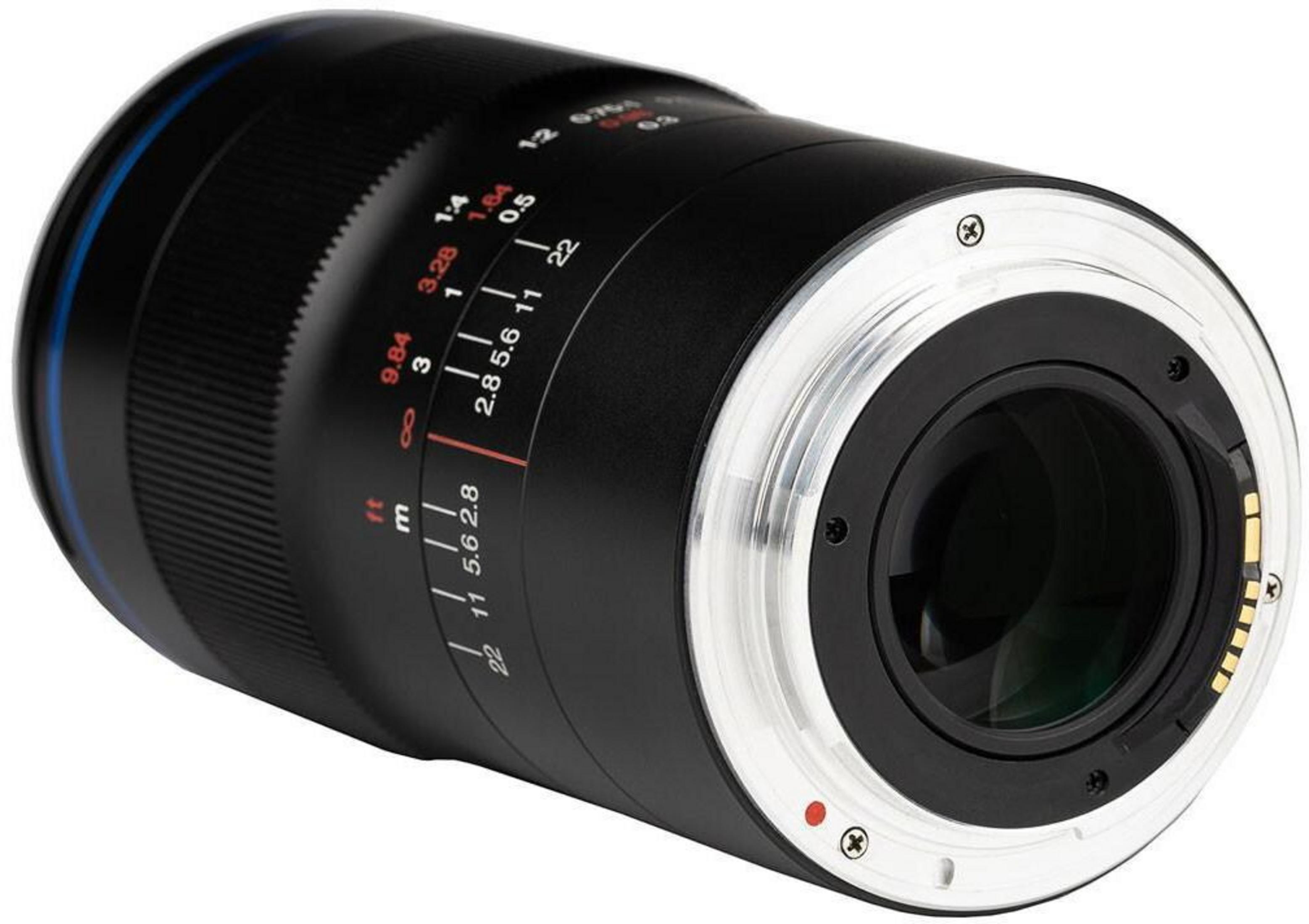 A black camera lens with a silver mount and focus/aperture markings.