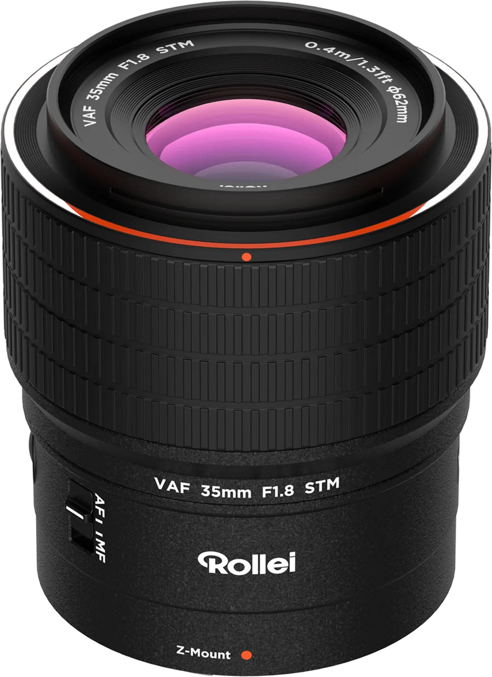 Un obiettivo per fotocamera nero con segni argentati e un effetto lente rosa.