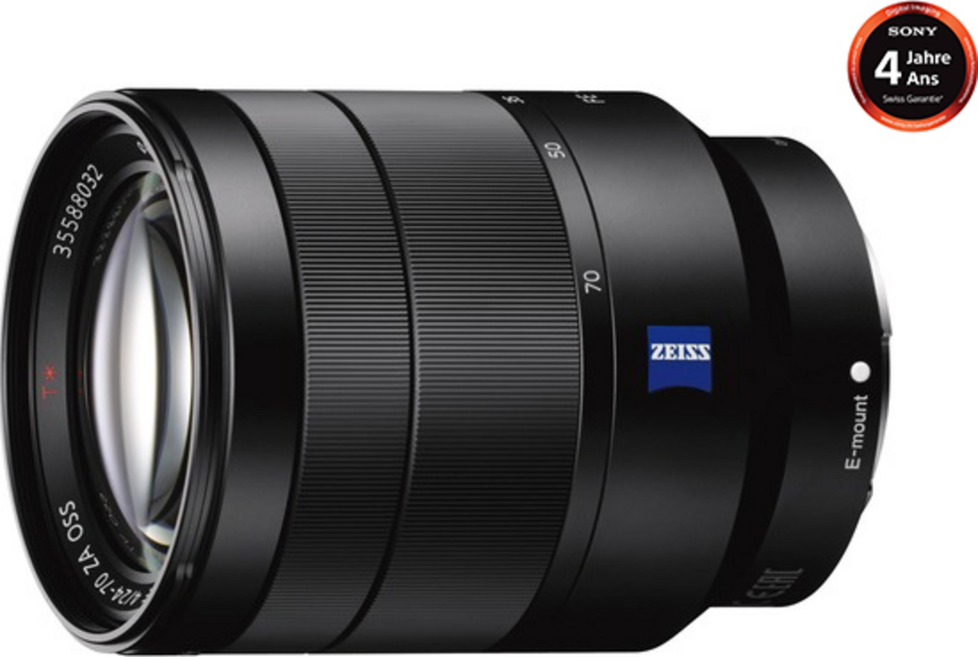 Un objetivo Sony Zeiss negro 24-70mm con anillo de zoom y marcas de distancia focal.