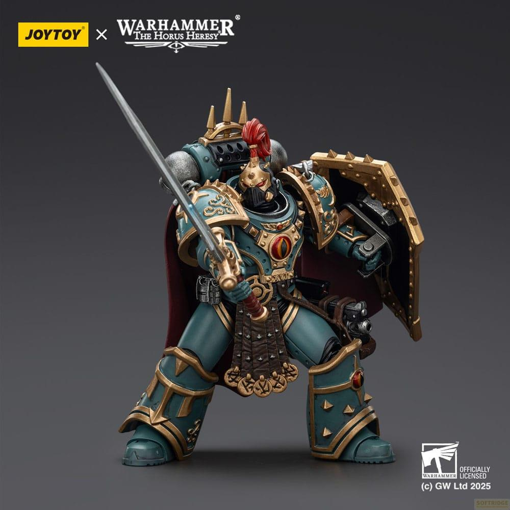 Wojownik w zielonej zbroi z mieczem i tarczą. Logo Warhammer na górze.