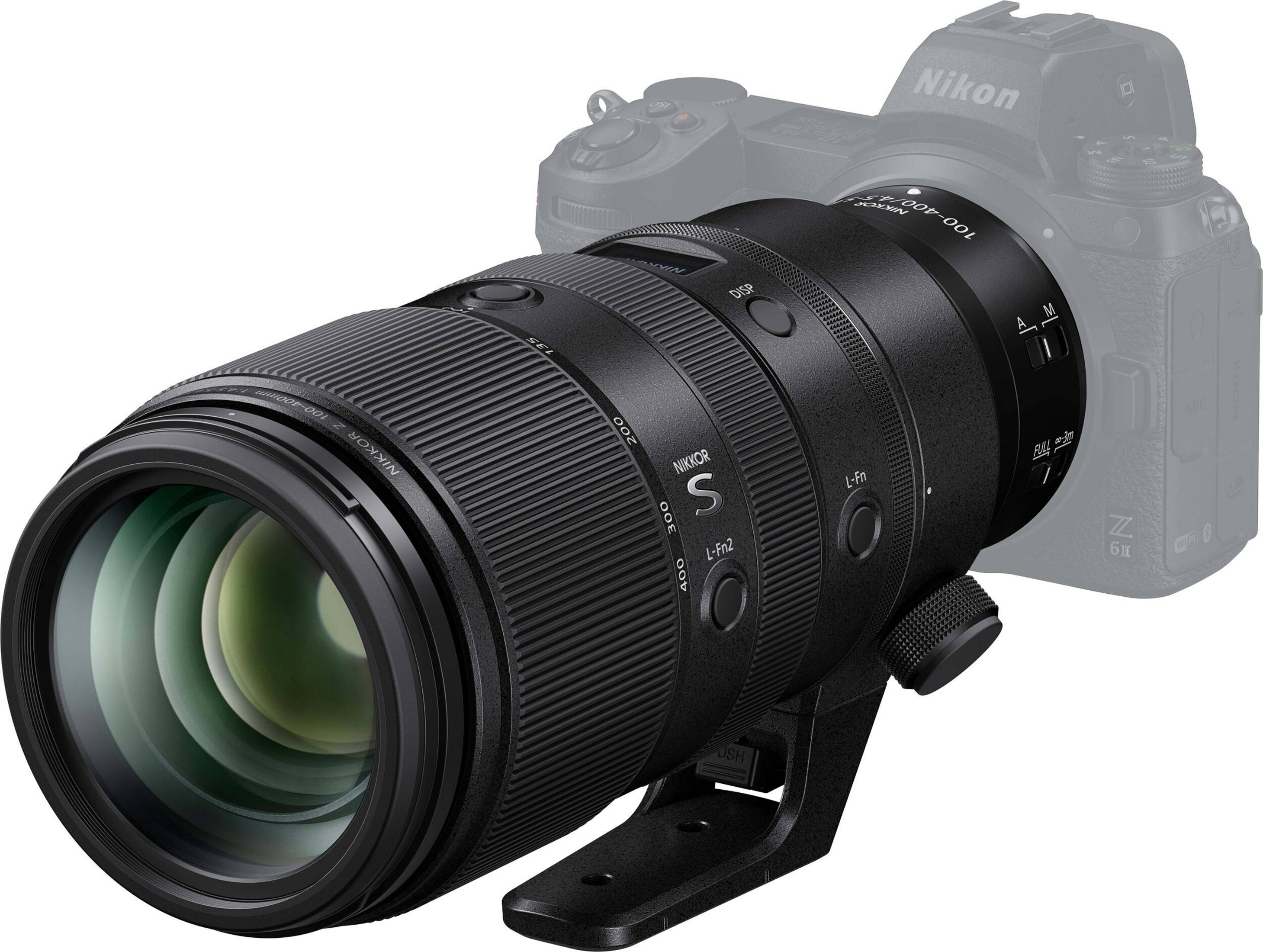Un objetivo NIKKOR Z 100-400mm negro está acoplado a una cámara Nikon.