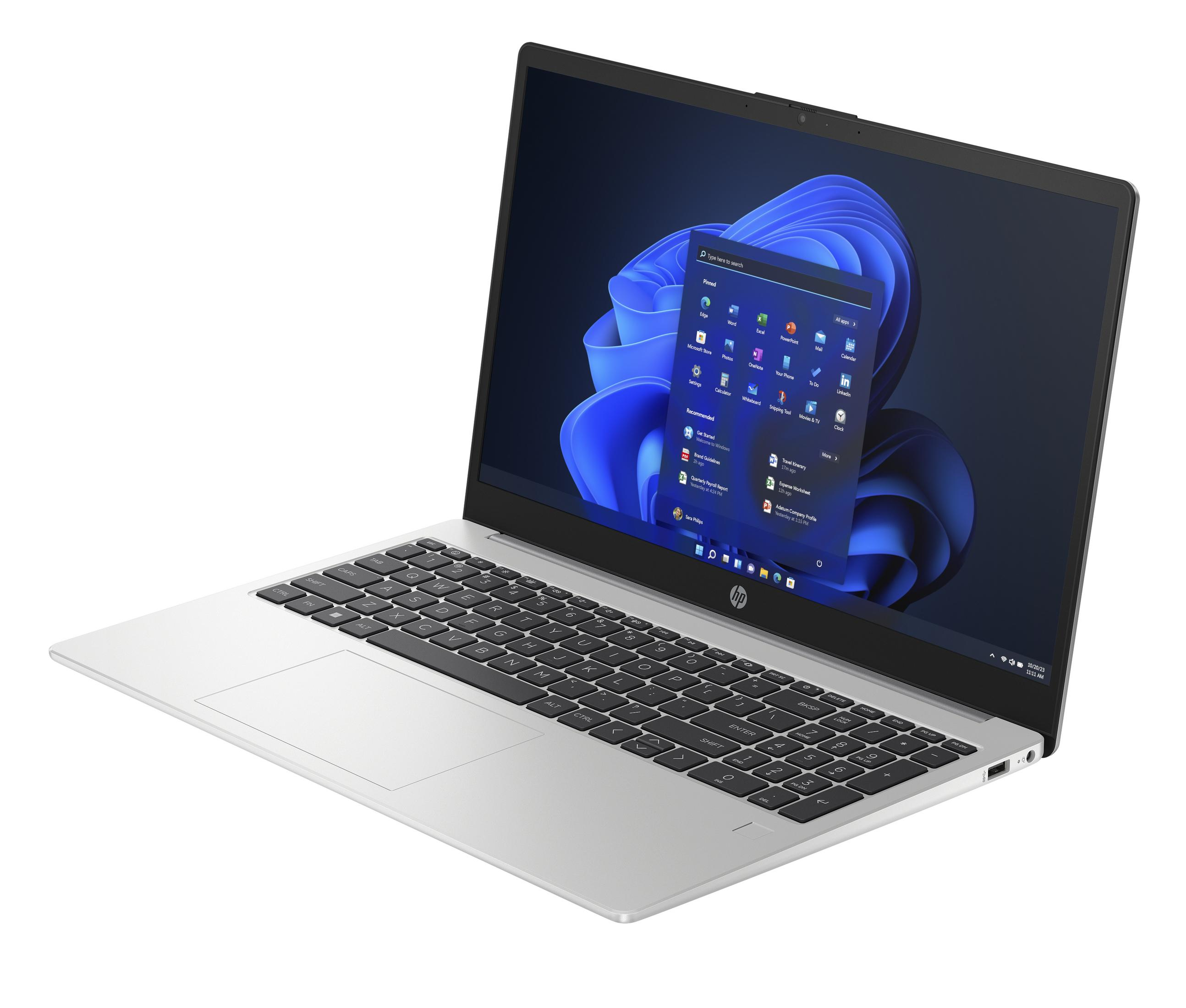 Un portátil plateado con teclado negro y pantalla oscura mostrando iconos de Windows 11.