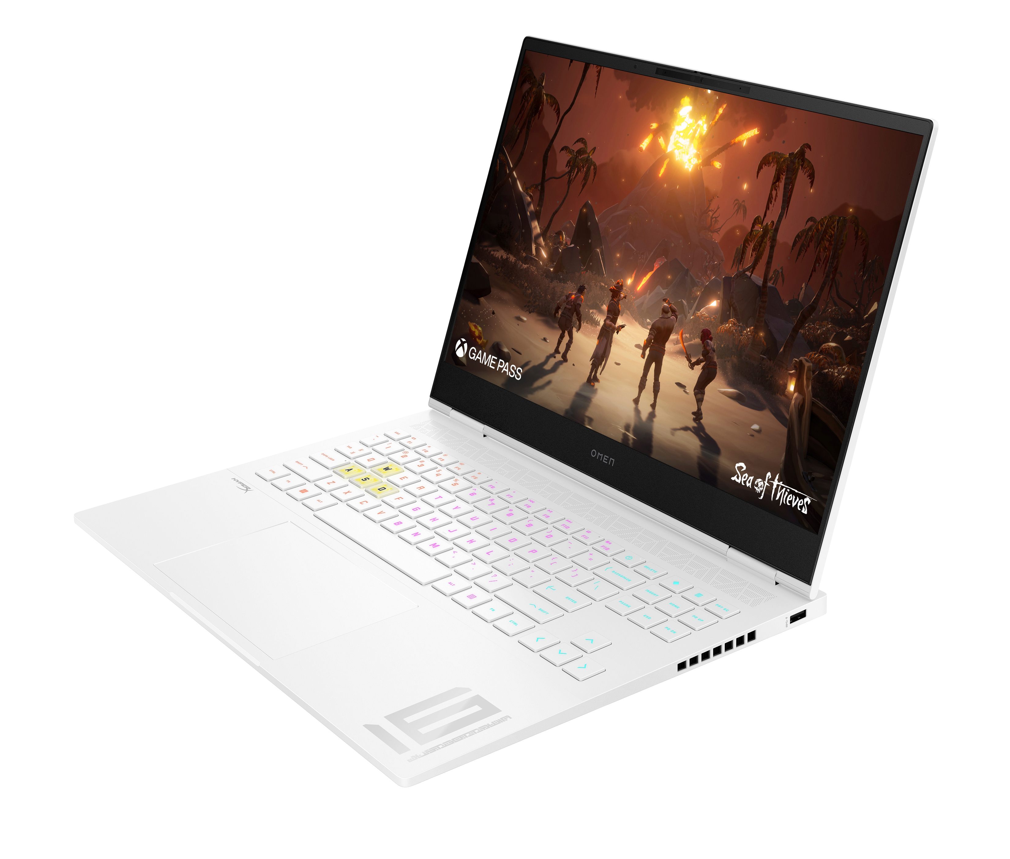 Biały laptop wyświetla grę "Sea of Thieves" z eksplozją wulkanu.