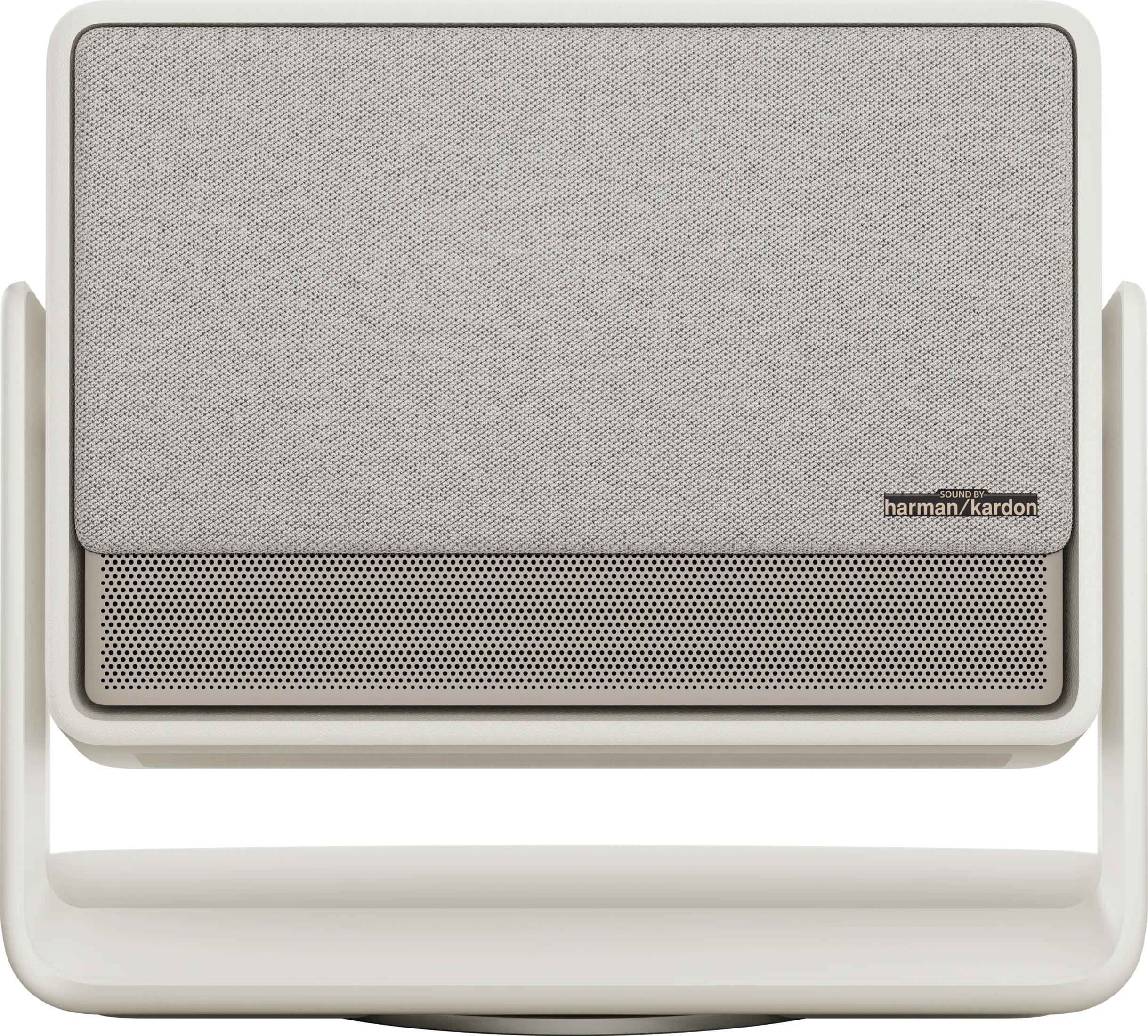 Enceinte grise en tissu avec façade perforée et logo Harman Kardon.
