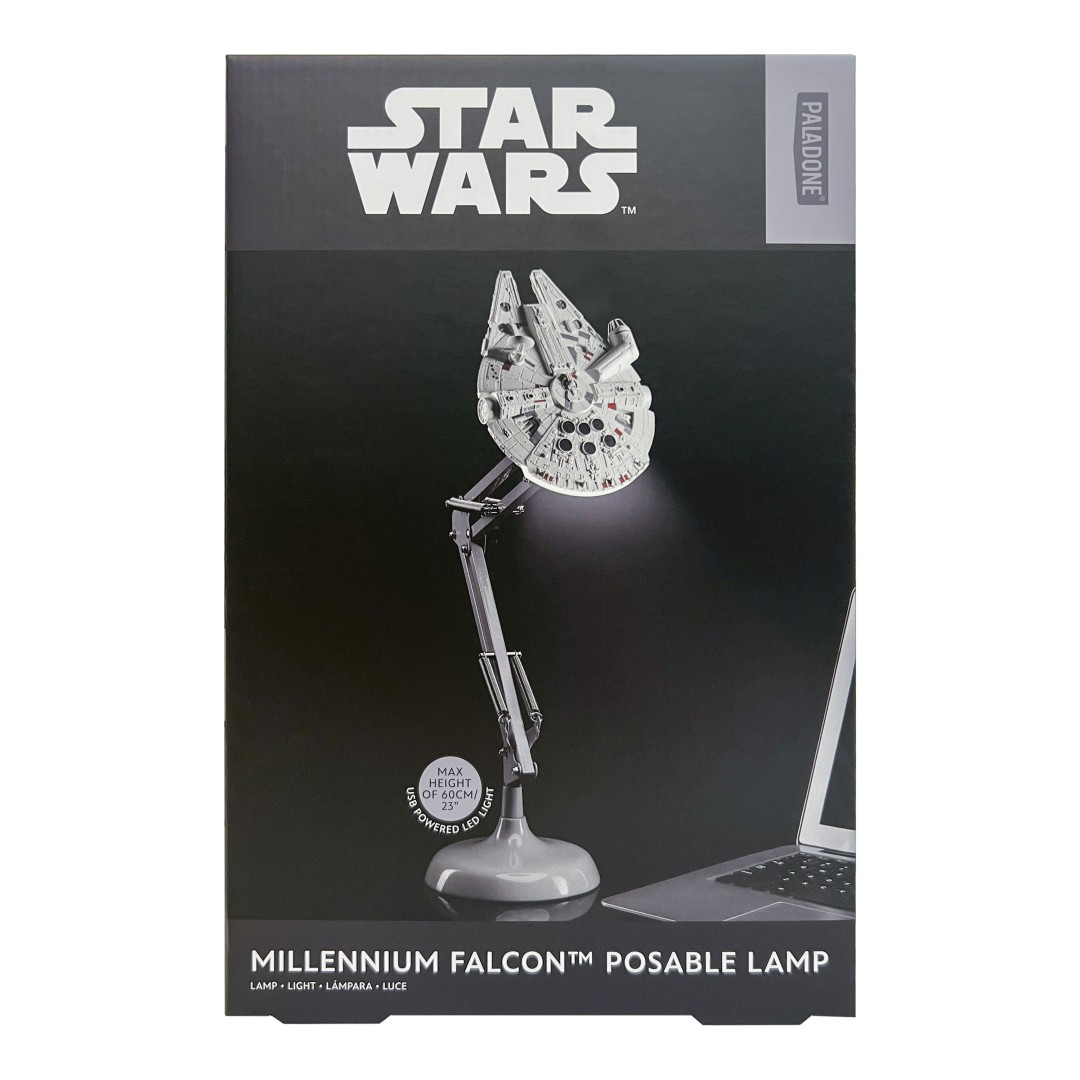 Lampa Star Wars Millennium Falcon na stojaku obok laptopa.