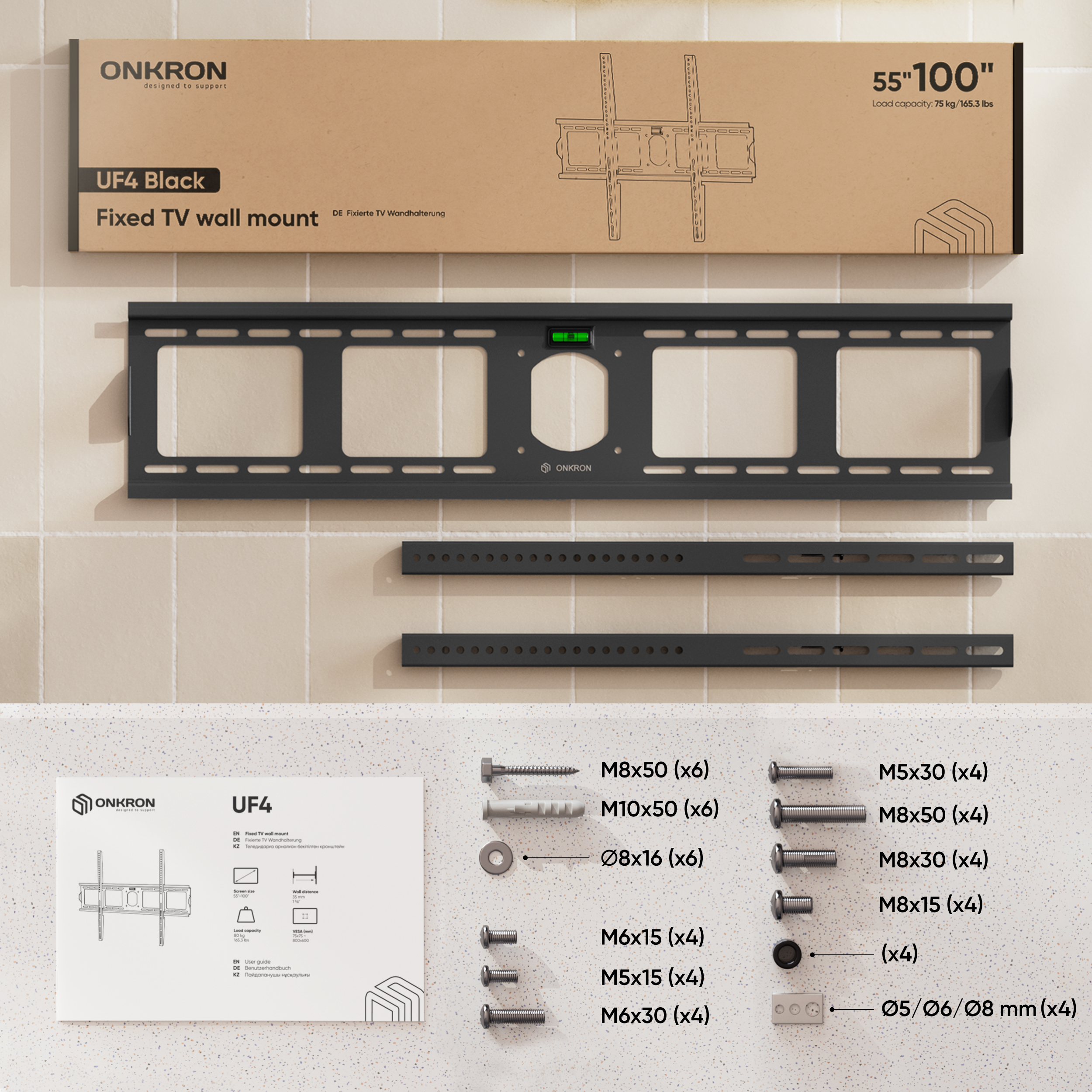 Supporto da parete TV nero con viti e istruzioni su tavolo piastrellato beige.