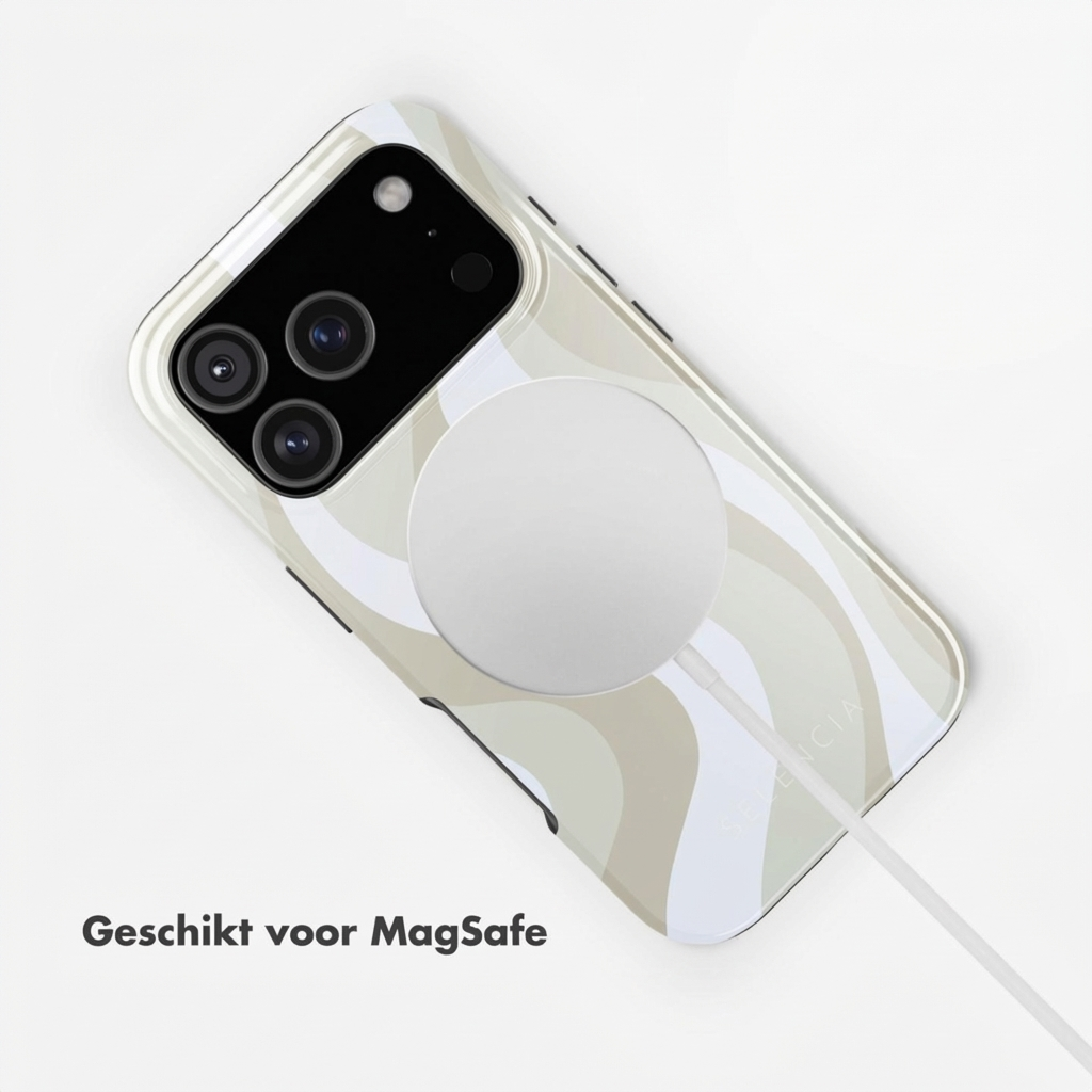 Un téléphone avec un étui à motif ondulé, chargeant avec MagSafe.