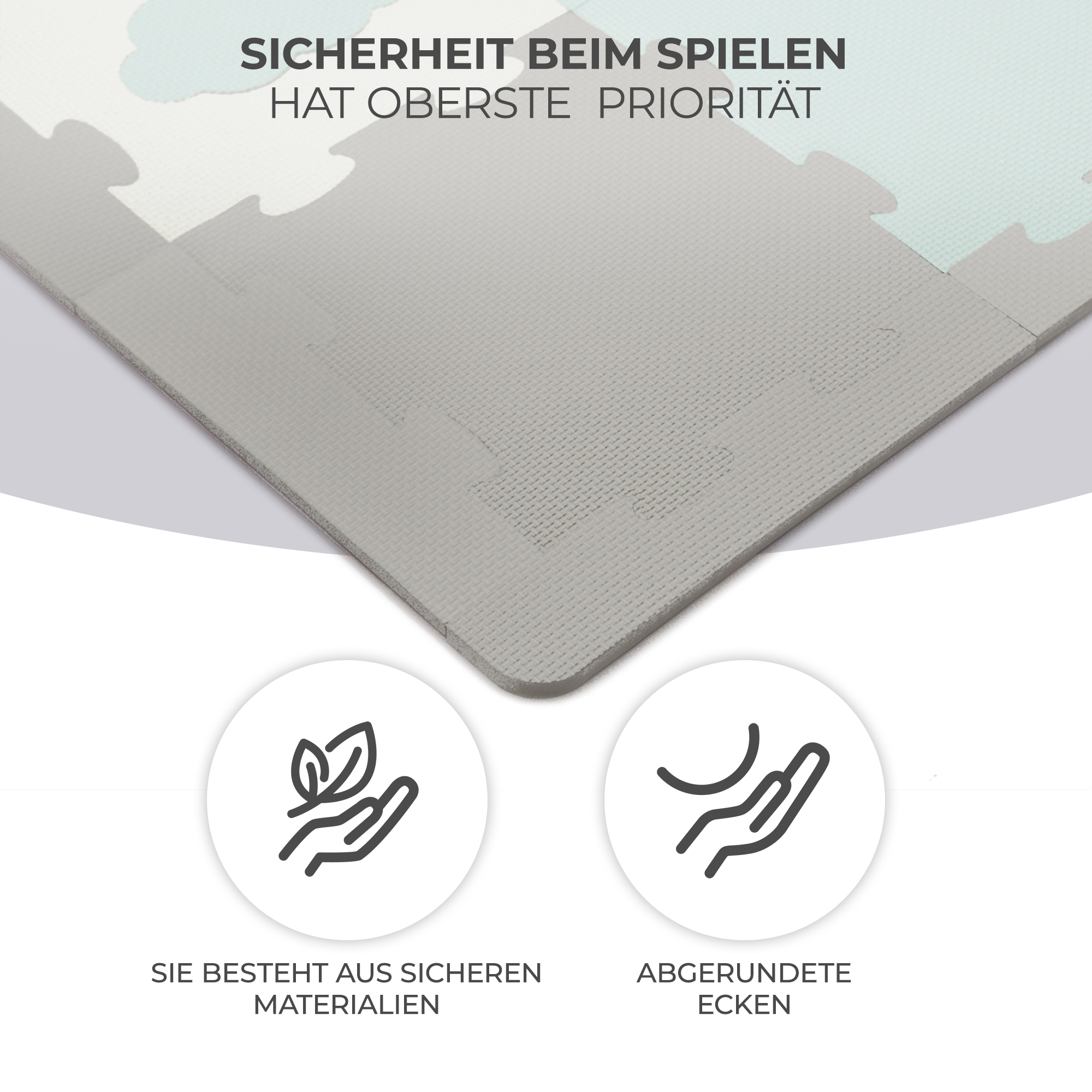 Graue und hellblaue Puzzlematte mit Symbolen für sichere Materialien und abgerundete Ecken.