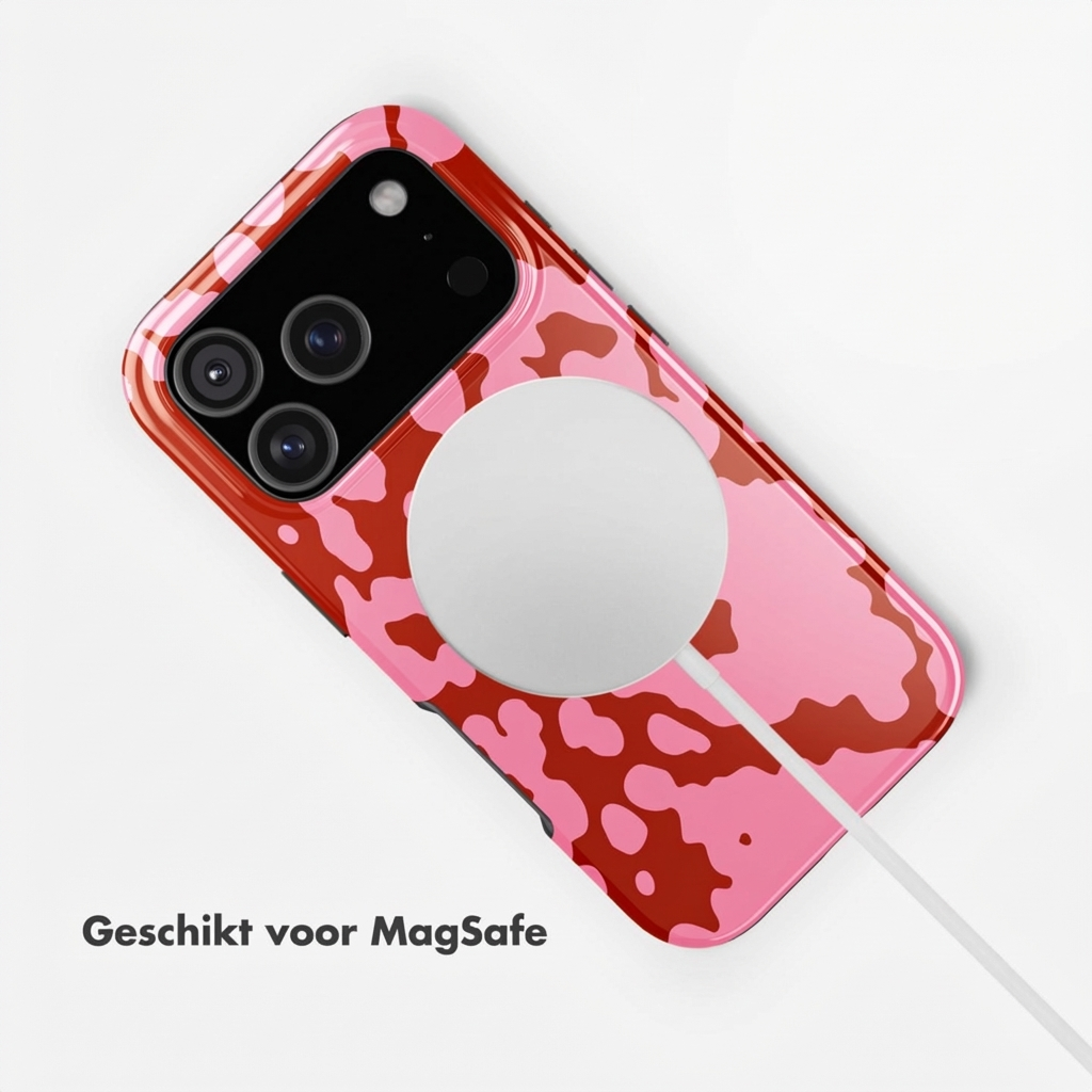 Rode iPhone hoes met roze koeienprint en MagSafe lader