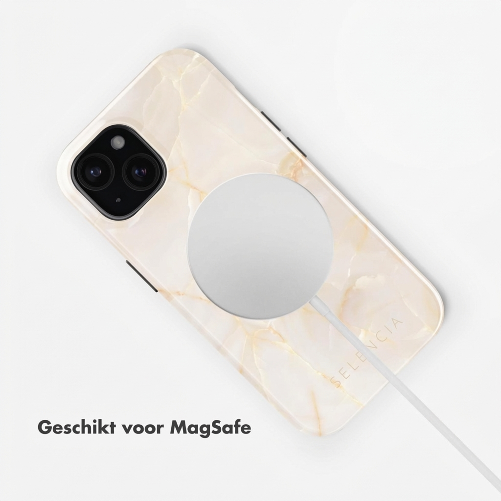 Een witte iPhone met marmerpatroon en MagSafe lader