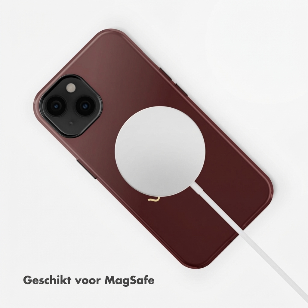 Een rode iPhone met MagSafe-oplader en witte kabel.