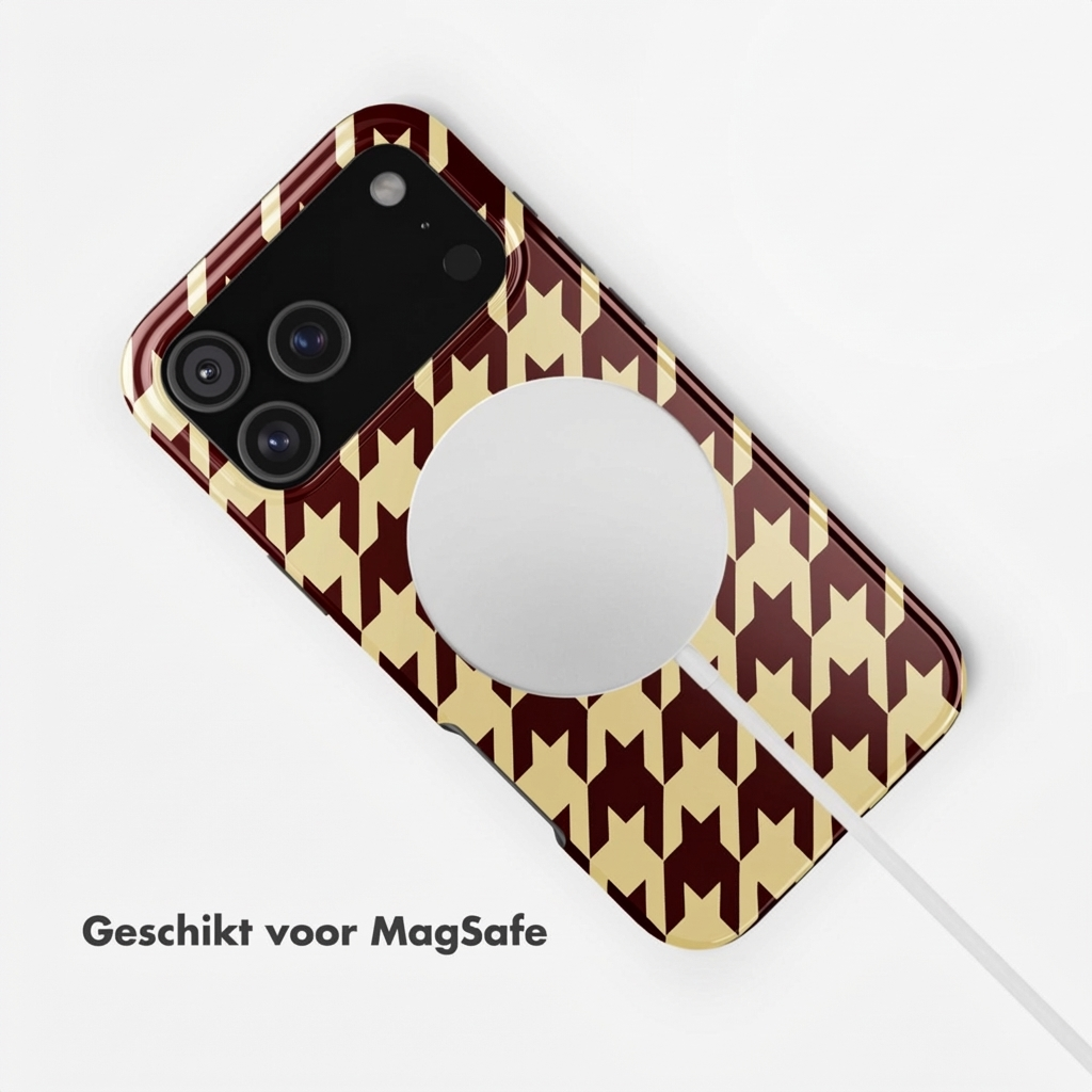 Een donkerrode en gele iPhone hoes met pied-de-poule patroon en MagSafe cirkel.
