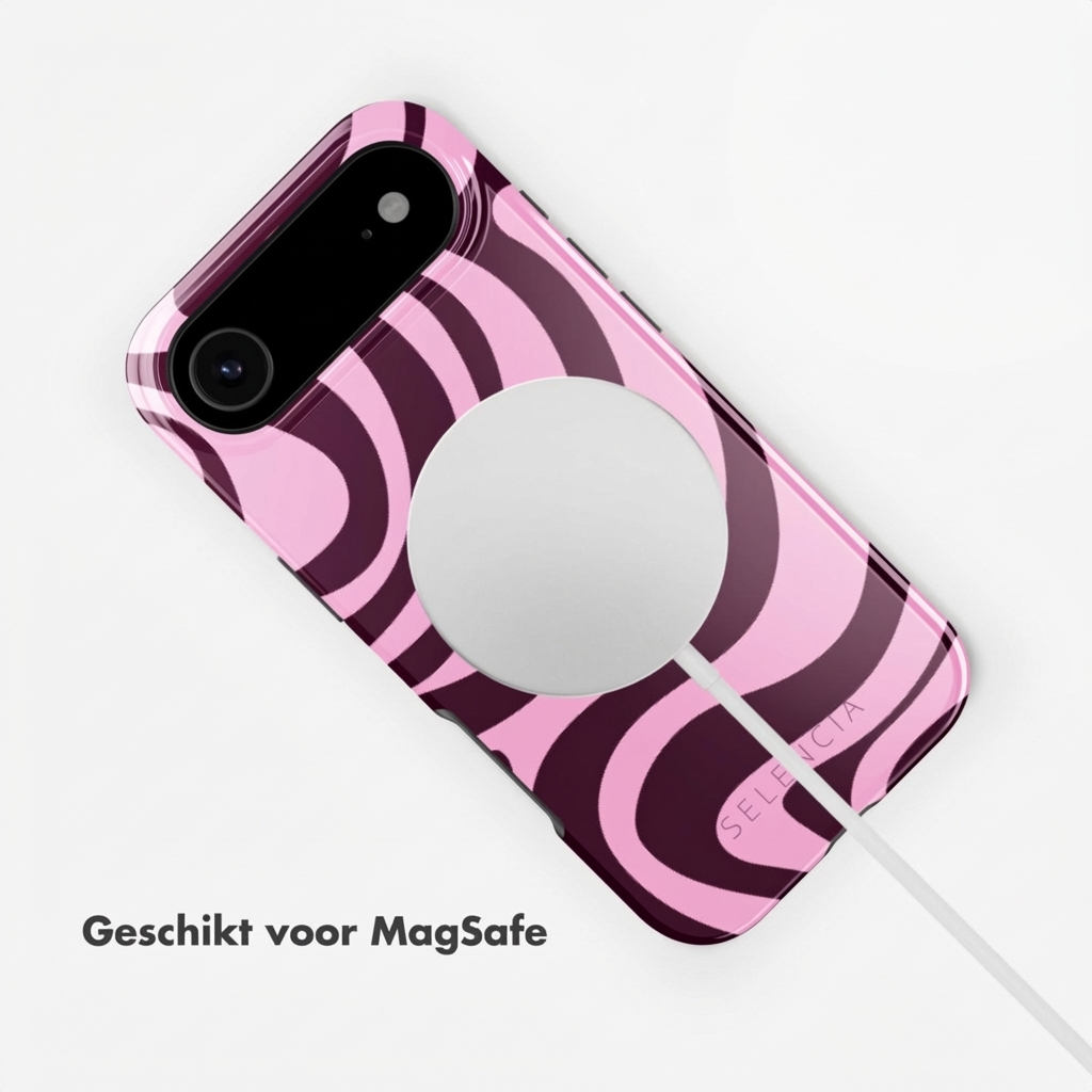Een roze telefoonhoesje met een wervelpatroon bevestigd aan een witte kabel.