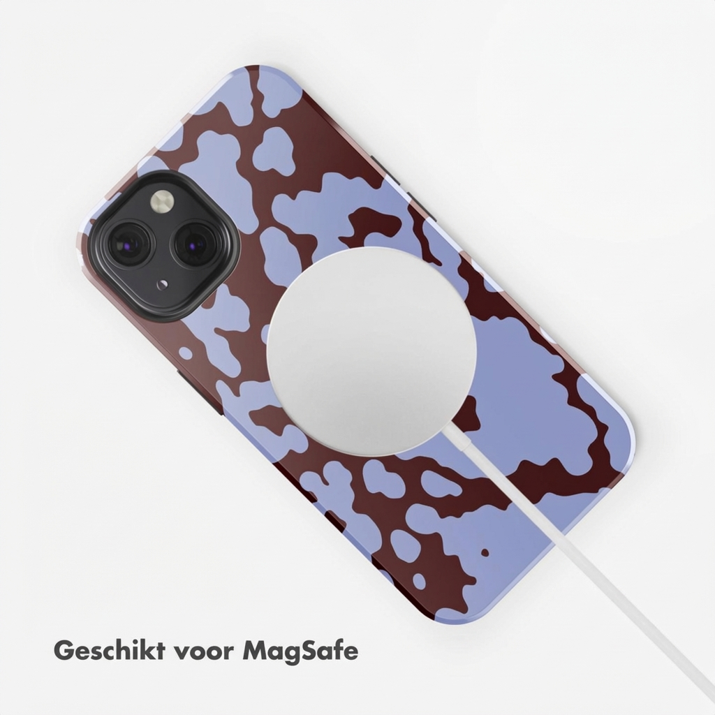 Een telefoon met blauw-bruin patroon en MagSafe-lader.
