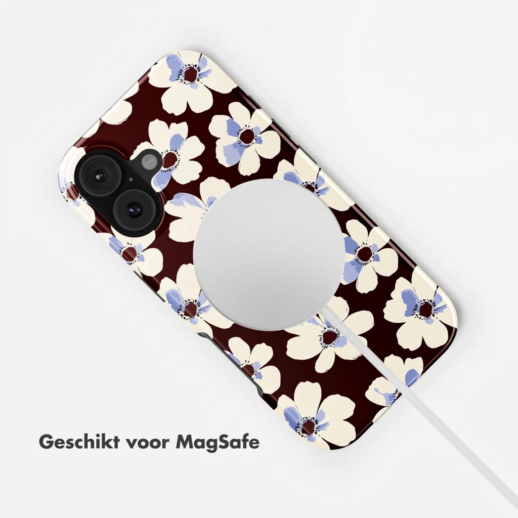 Donkerbruine telefoonhoes met wit-blauw bloemenpatroon en MagSafe-cirkel.
