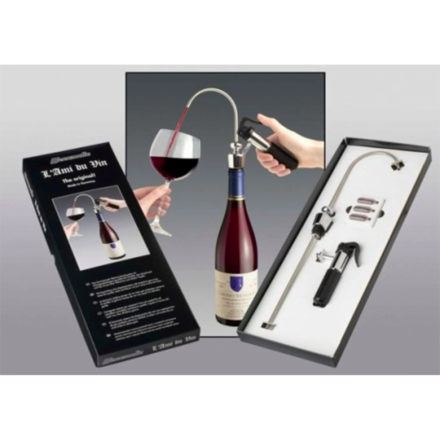 Un set di aeratore per vino con bottiglia, bicchiere e attrezzo in una scatola.