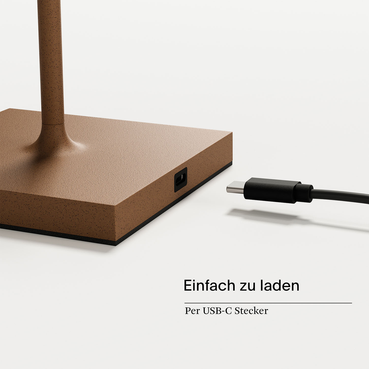 Brauner Sockel mit USB-C-Anschluss und Kabel.