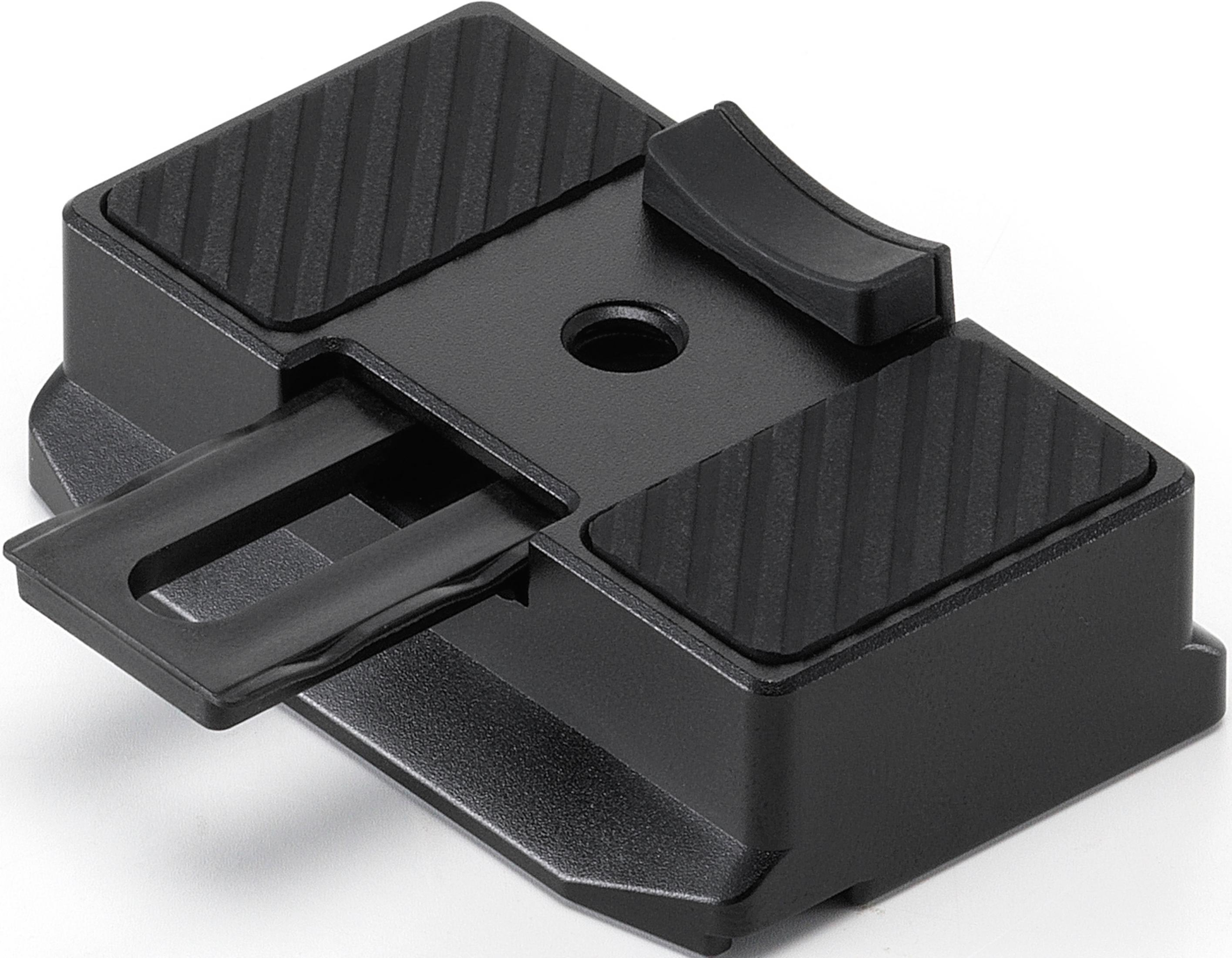 Schwarzer Kamerablitzschuh-Adapter mit Gummipolstern und Verriegelungsmechanismus.