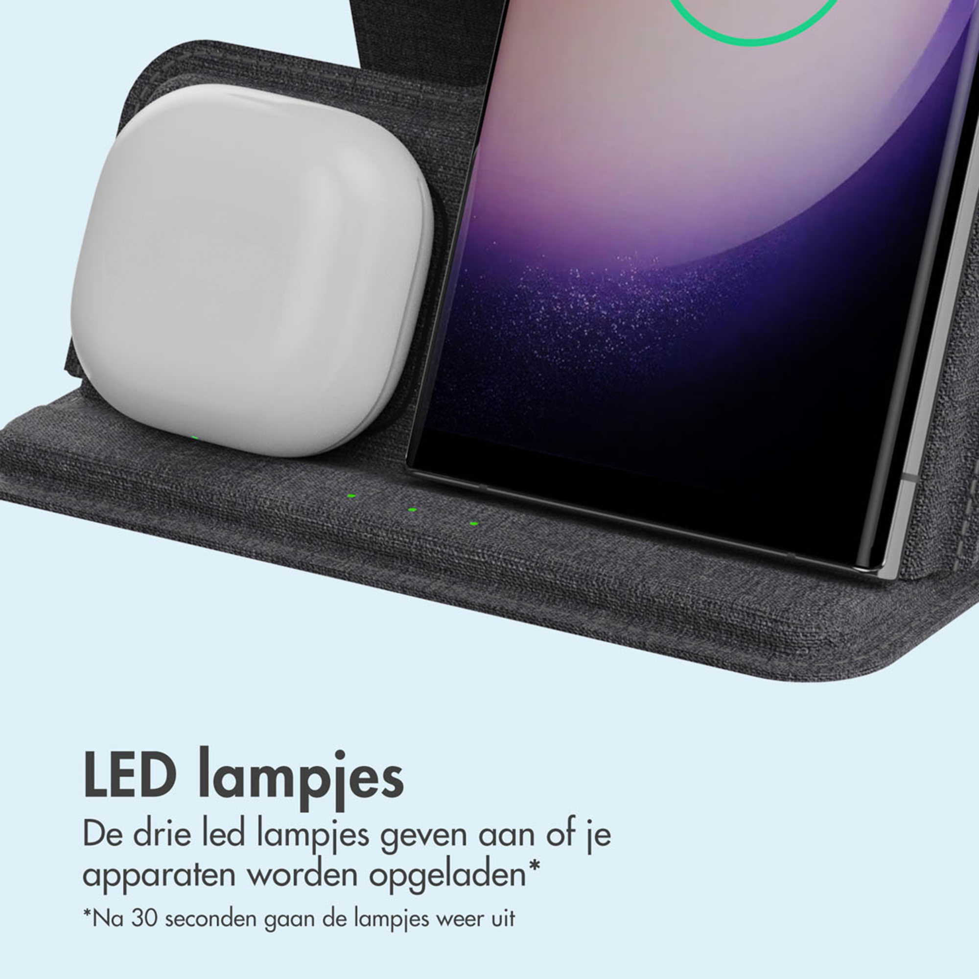 Een wit oplaadobject naast een smartphone met paars oplaadscherm.