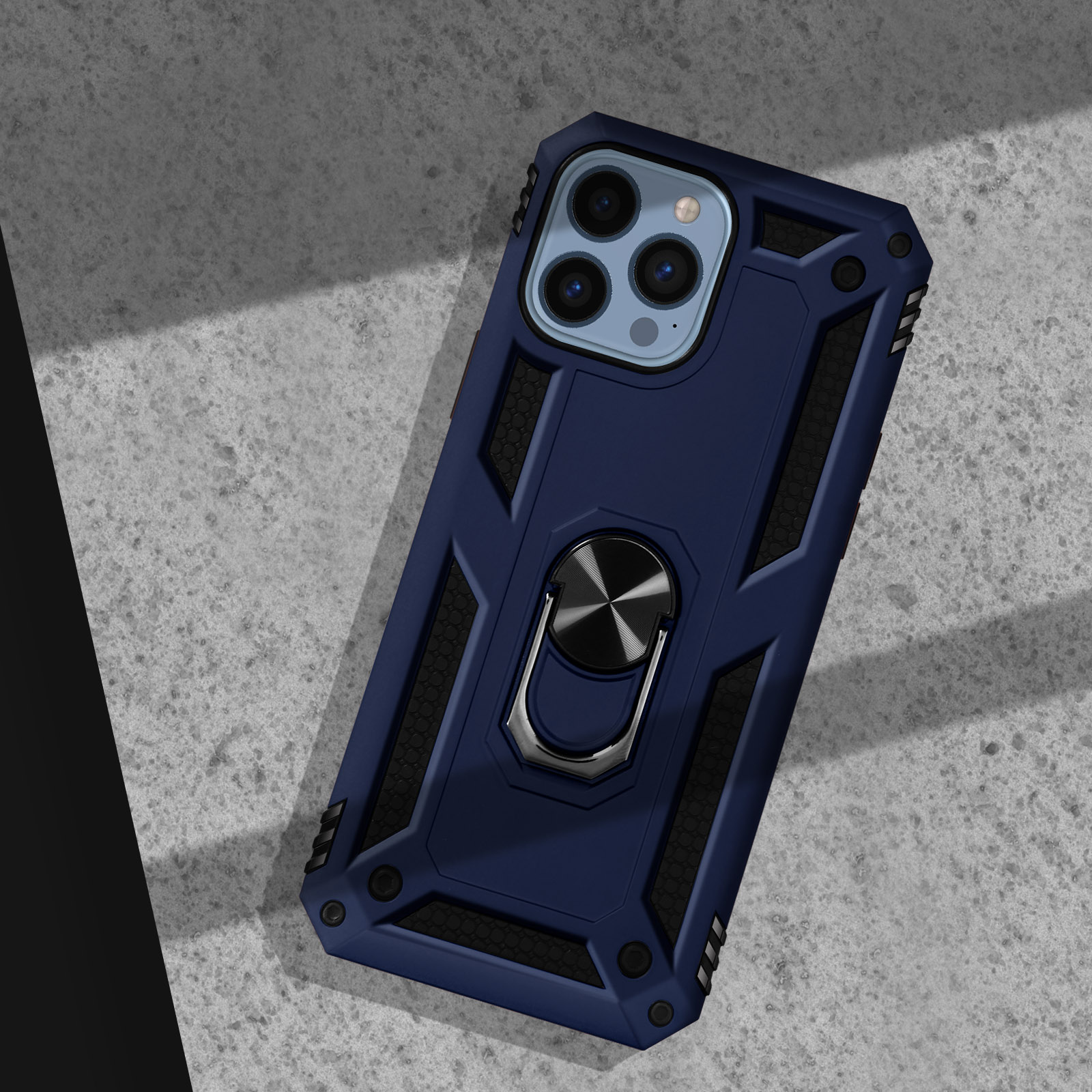 Donkerblauwe telefoonhoes met ringhouder op betonnen ondergrond.