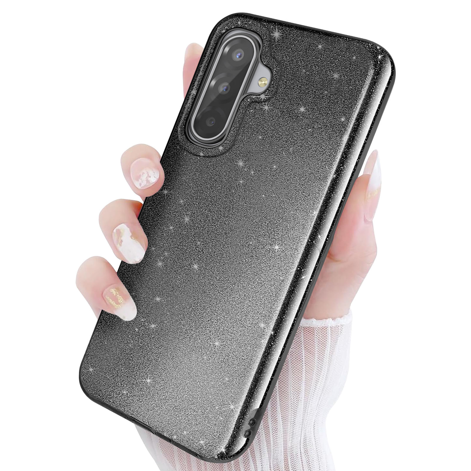 Une main tient une coque de téléphone noire scintillante à motif d'étoiles.