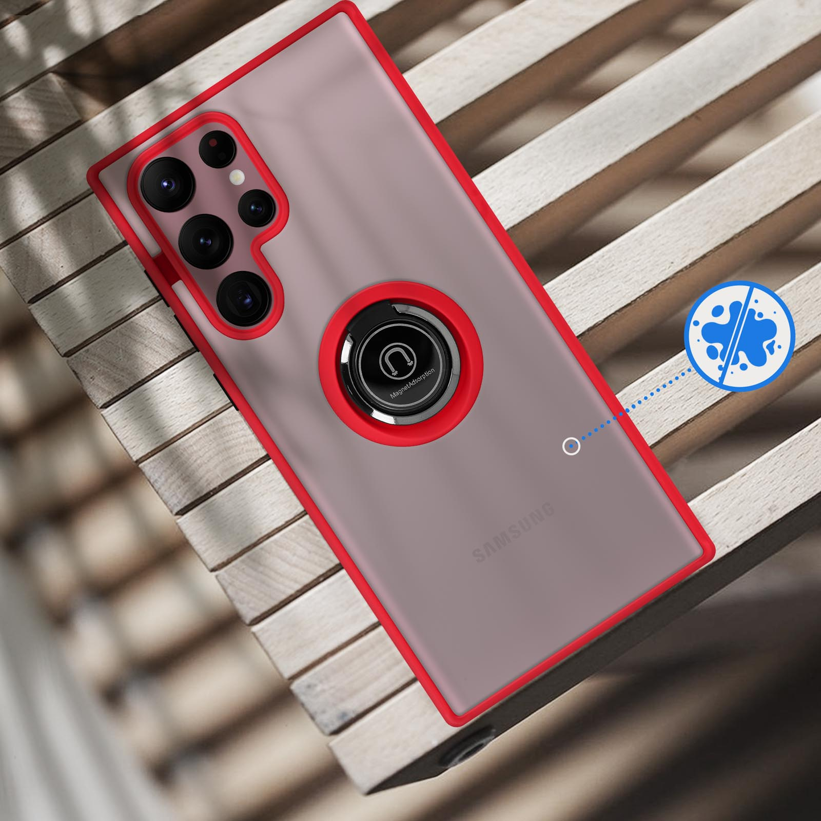 Un smartphone avec cadre rouge et support bague repose sur des lamelles en bois.