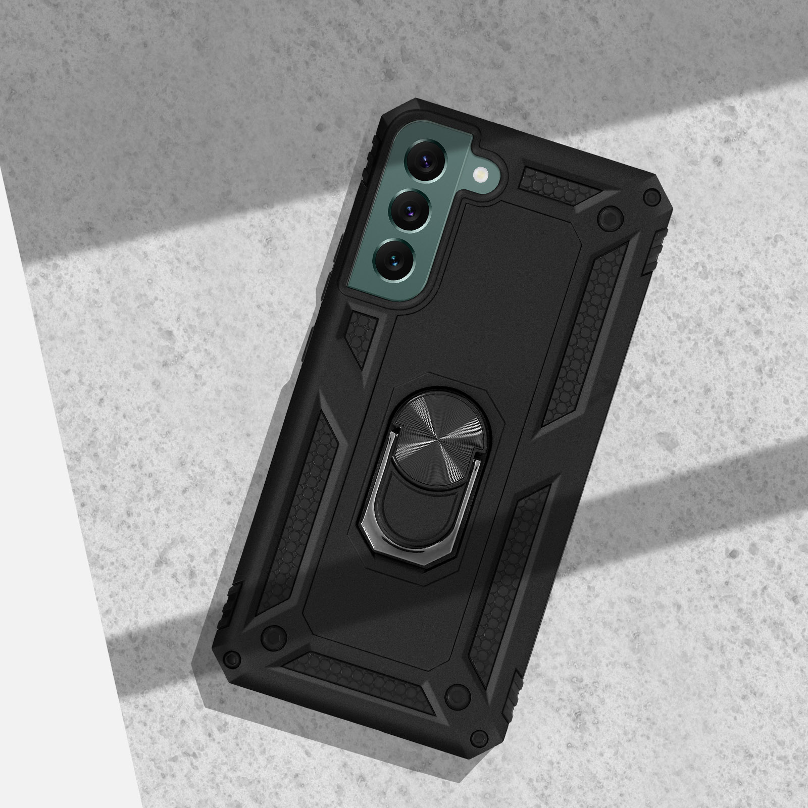 Zwarte telefoonhoes met ringhouder op getextureerd oppervlak.