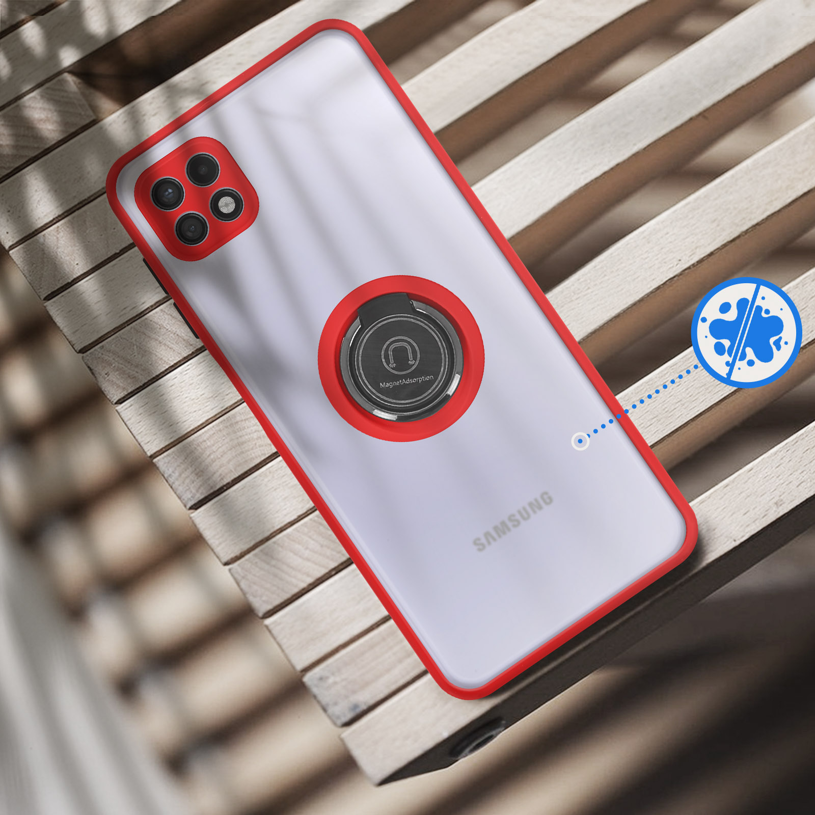 Custodia rossa su telefono con anello magnetico su legno.