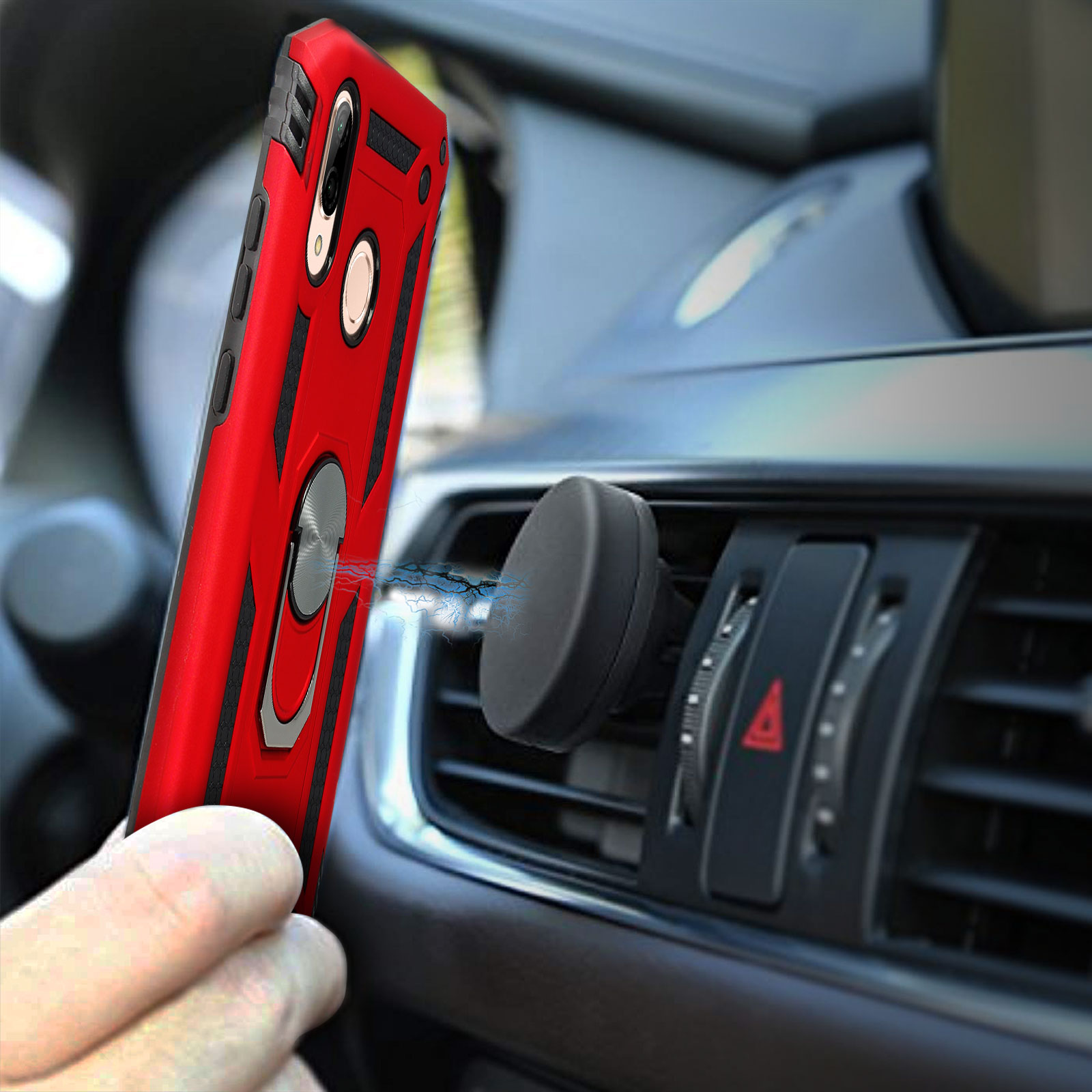 Coque rouge pour téléphone avec anneau fixée à une aération de voiture.