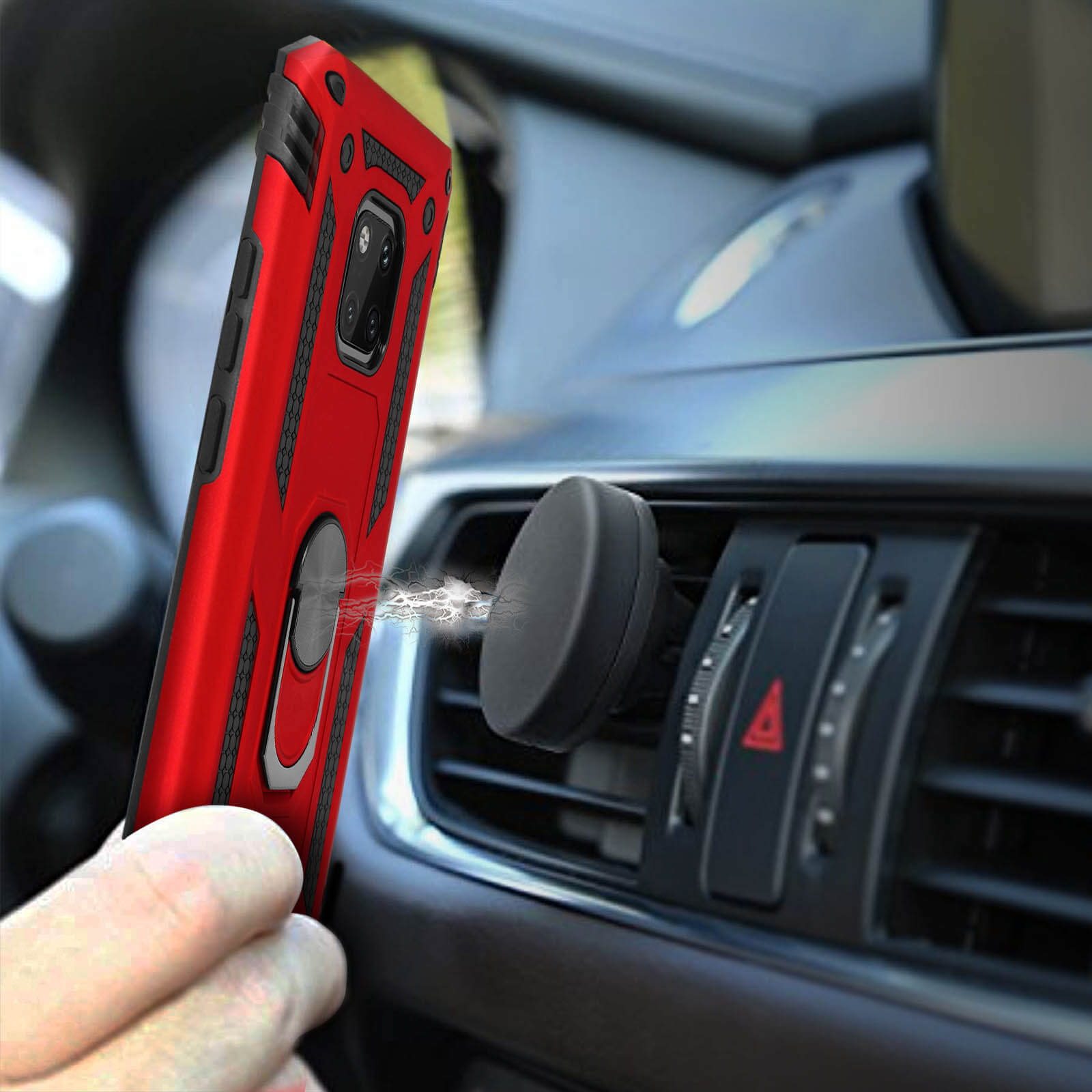 Une coque de téléphone rouge avec un anneau est fixée magnétiquement à une aération de voiture.
