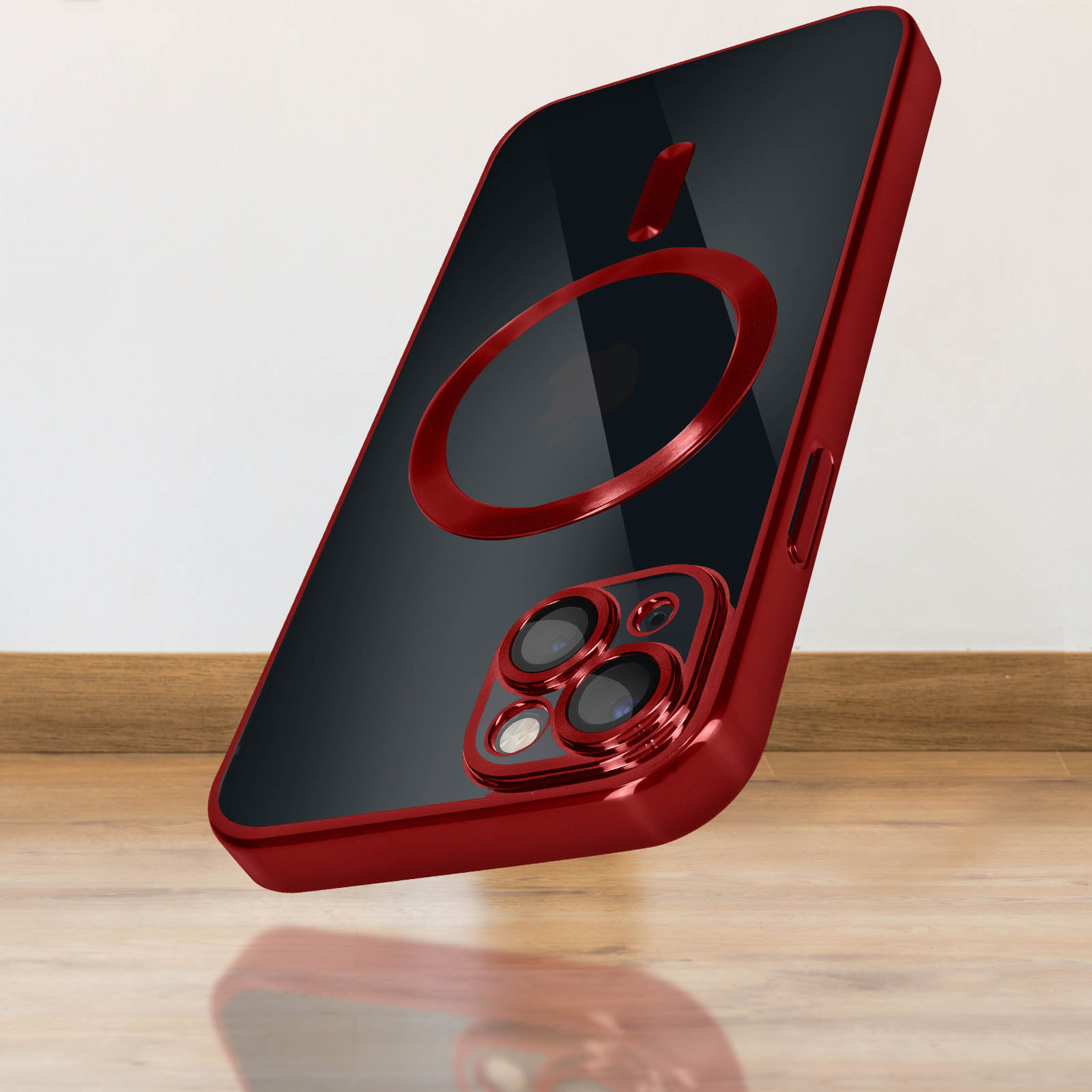 Coque de téléphone rouge avec caméras et anneau magnétique sur plancher en bois.