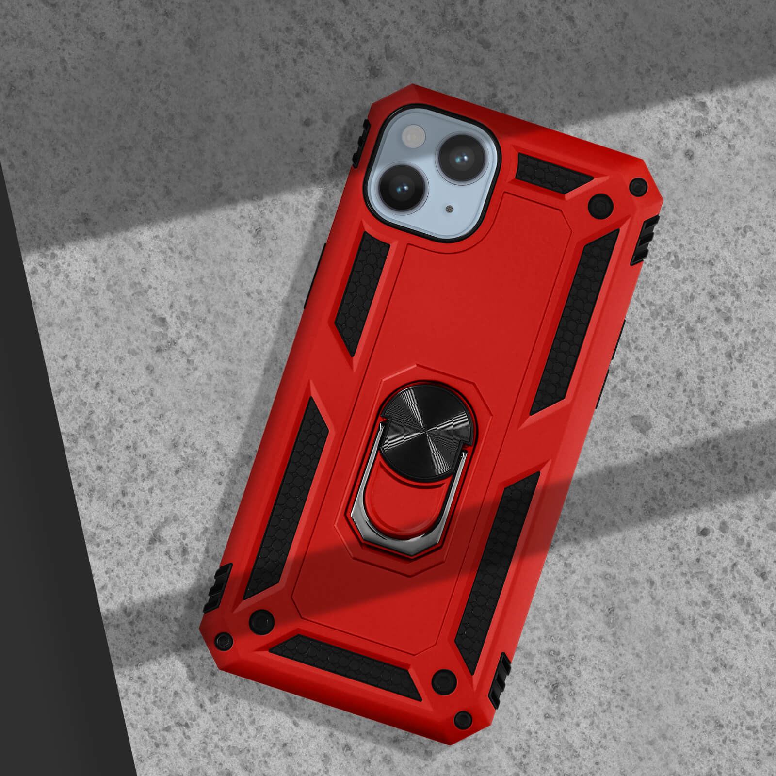 Coque de téléphone rouge avec support anneau sur surface béton avec ombres.