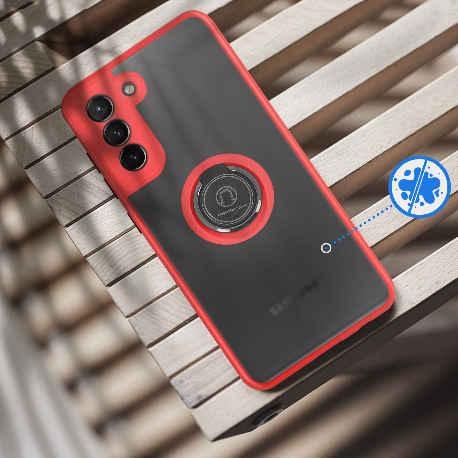 Coque de téléphone rouge avec anneau MagSafe sur fond bois.