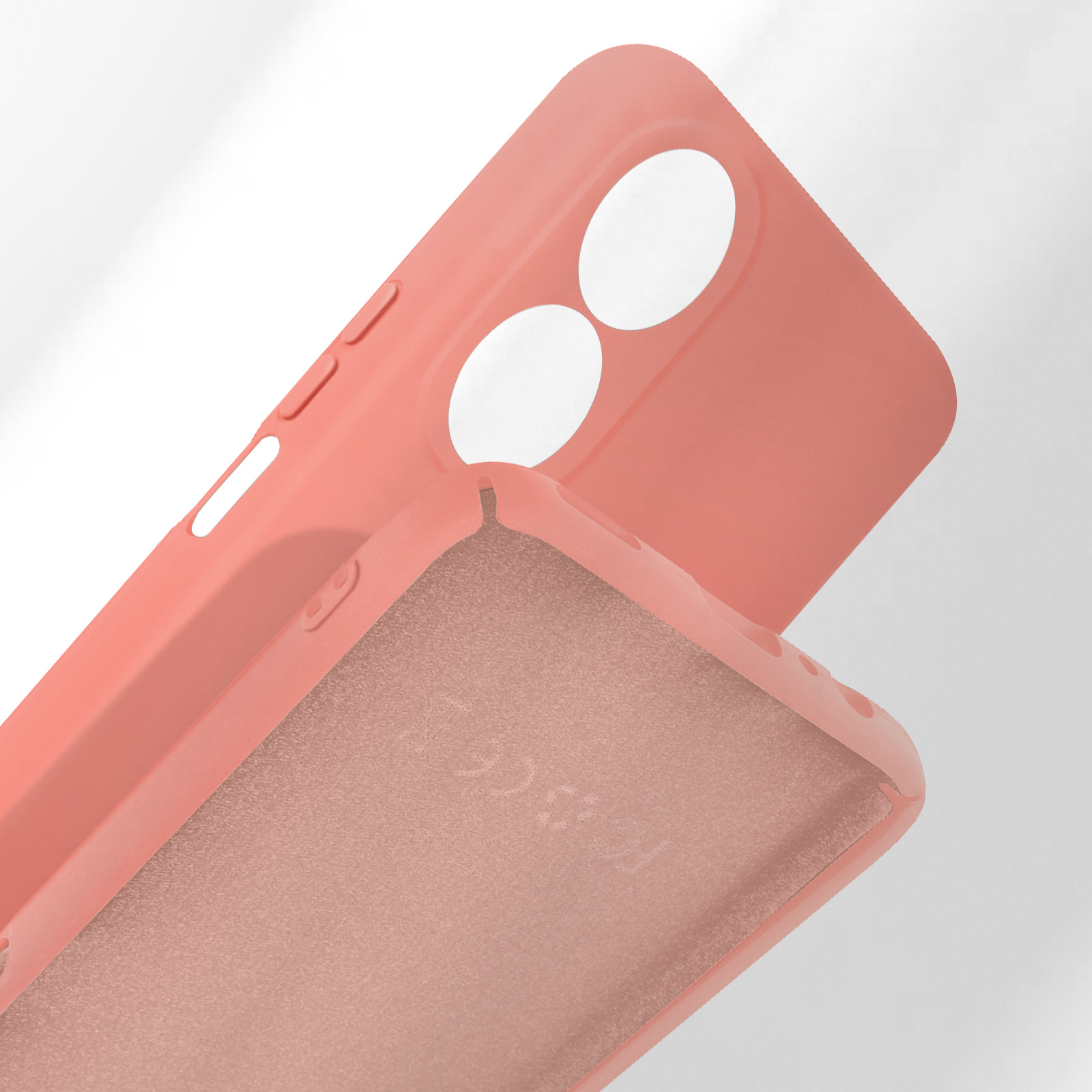 Una custodia corallo per telefono con ritagli per fotocamere e pulsanti.