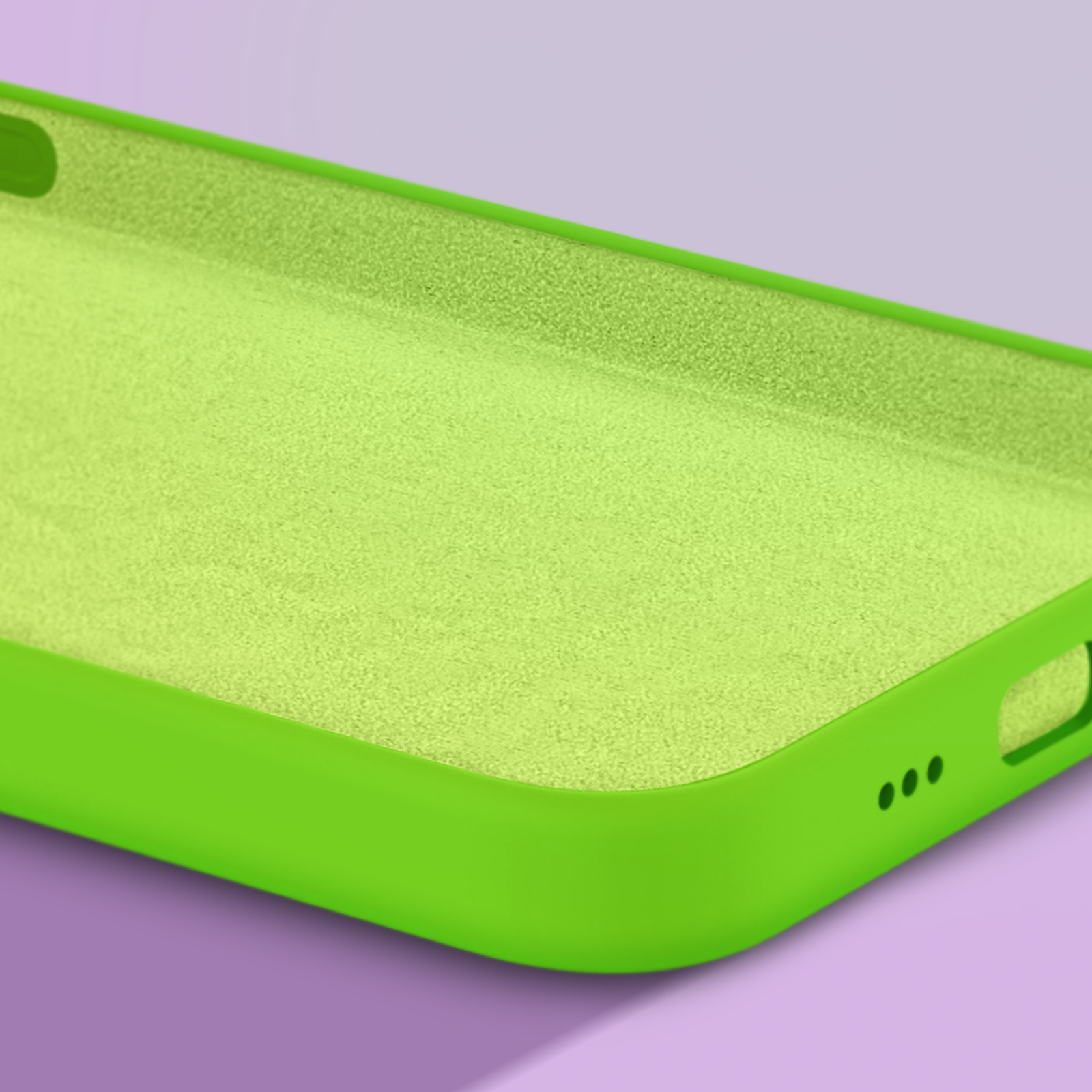 Coque de téléphone vert vif à intérieur texturé, sur fond violet.