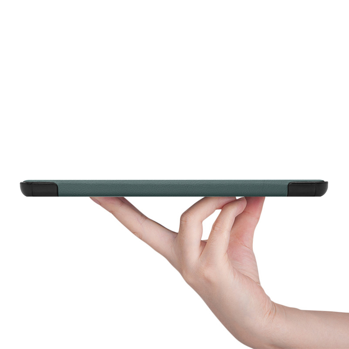 A hand holds a dark teal tablet with black trim.